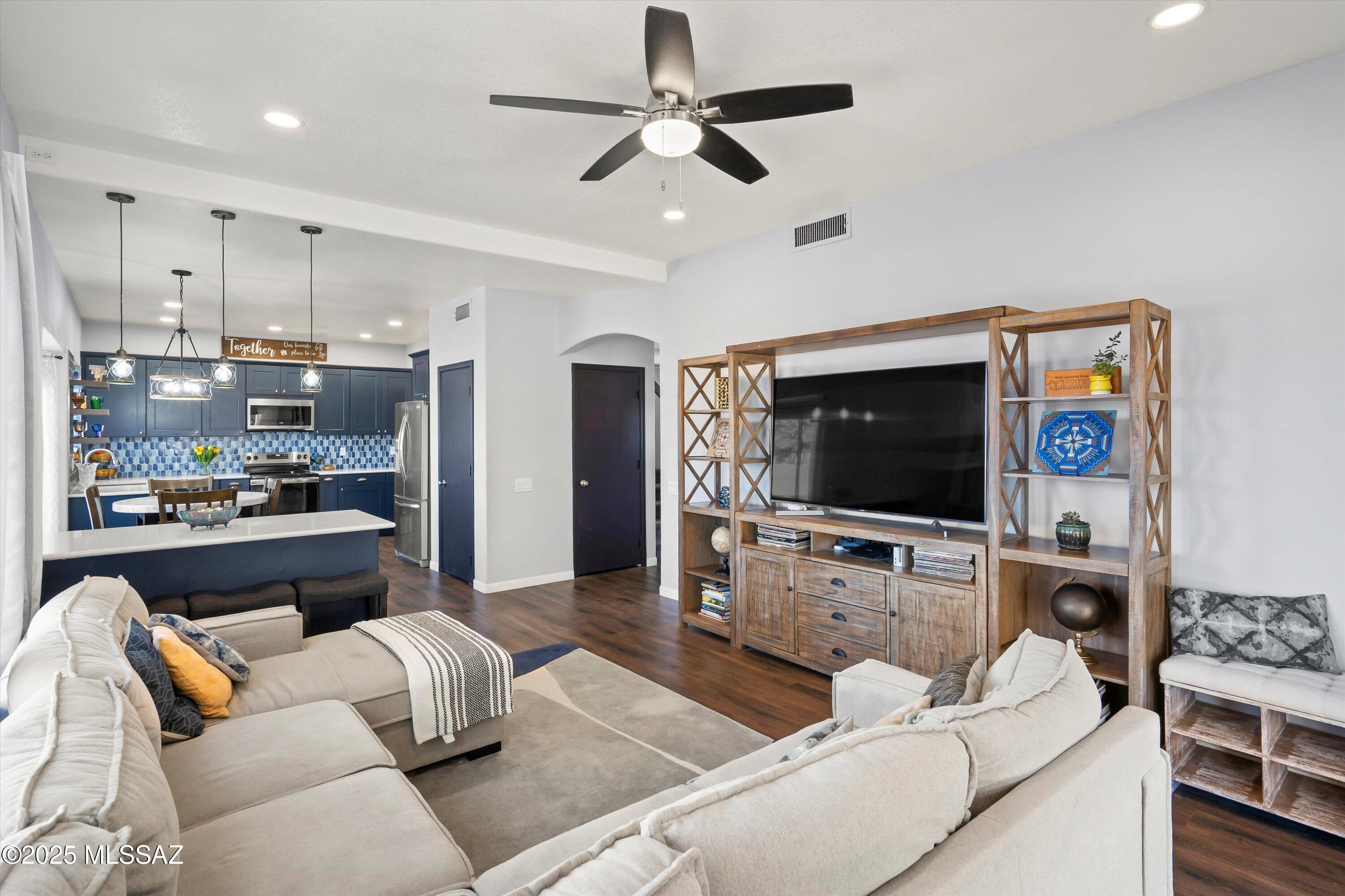Range price: $400,000-425,000. Busy lifestyle? Meet the home that works for you. Located in the desirable Continental Ranch community, this move-in-ready 5-bedroom, 2.5-bath home offers modern upgrades and everyday functionality. Step into a bright, updated interior designed for both comfort and efficiency. The open-concept kitchen is a true hub of the home, featuring custom tile, quartz counters, and brand-new stainless steel appliances, perfect for hosting or grabbing a quick bite before heading out the door. Need a quiet space to work or create? The flexible downstairs bedroom is ideal as a home office or den. Fresh laminate flooring, plush carpeting, and designer bathroom finishes throughout add style without sacrificing function. Major systems were updated in 2022, including a new five-ton AC unit, water heater, and heating system, saving you time, money, and hassle. Step outside to your private backyard escape with direct access to a scenic neighborhood park. Enjoy Continental Ranch's top-tier amenities, two community pools and spas, basketball and pickleball courts, a skate park, clubhouse, and miles of walking and biking trails. Adventure is always within reach with Saguaro National Park West just minutes away. With easy access to I-10, top-rated schools, shopping, and dining, this home makes daily life easier, simpler, and better. Come see why Continental Ranch remains one of Northwest Tucson's most loved communities. Your next chapter starts here, schedule a tour today.