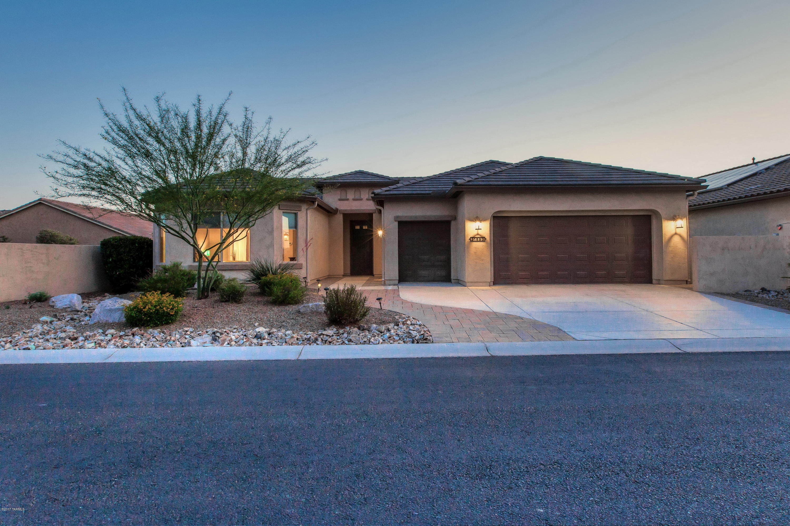 This Cortez Model overlooks the 18th green & fairway. Enjoy breathtaking sunsets & incredible Mountain views from the dining room, living room, covered patio, firepit & master bedroom. The moment you enter you know you are going to love it here. 11’ ceilings and picture windows allow for natural lighting & viewing of the expansive outdoor living area & mature landscaping. Chef's kitchen offers abundant counter space, ample storage & large island for prepping, eating, entertaining. Enjoy outdoor living under covered patio with ceiling fan. On cool desert nights view sunsets from the warmth of your circular firepit. Great house for entertaining or cozying up in. Amenities include: Bay windows, SS APPL, Quartz CNTP, 4’ garage ext, Smart WTR SYS & Patio Solar Shades. Home can be sold turnk