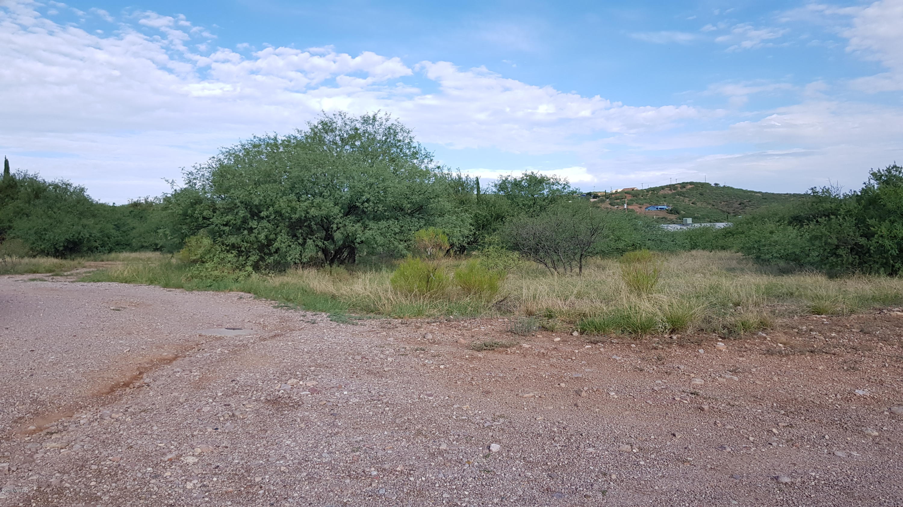 Multi-family level .31 acre lot with beautiful Eastern mountain views on the corner of Calle Cipres and West Frontage Rd. Easy access to highway either Exit 22 coming from North or Exit 17 coming from South. Great investment opportunity!