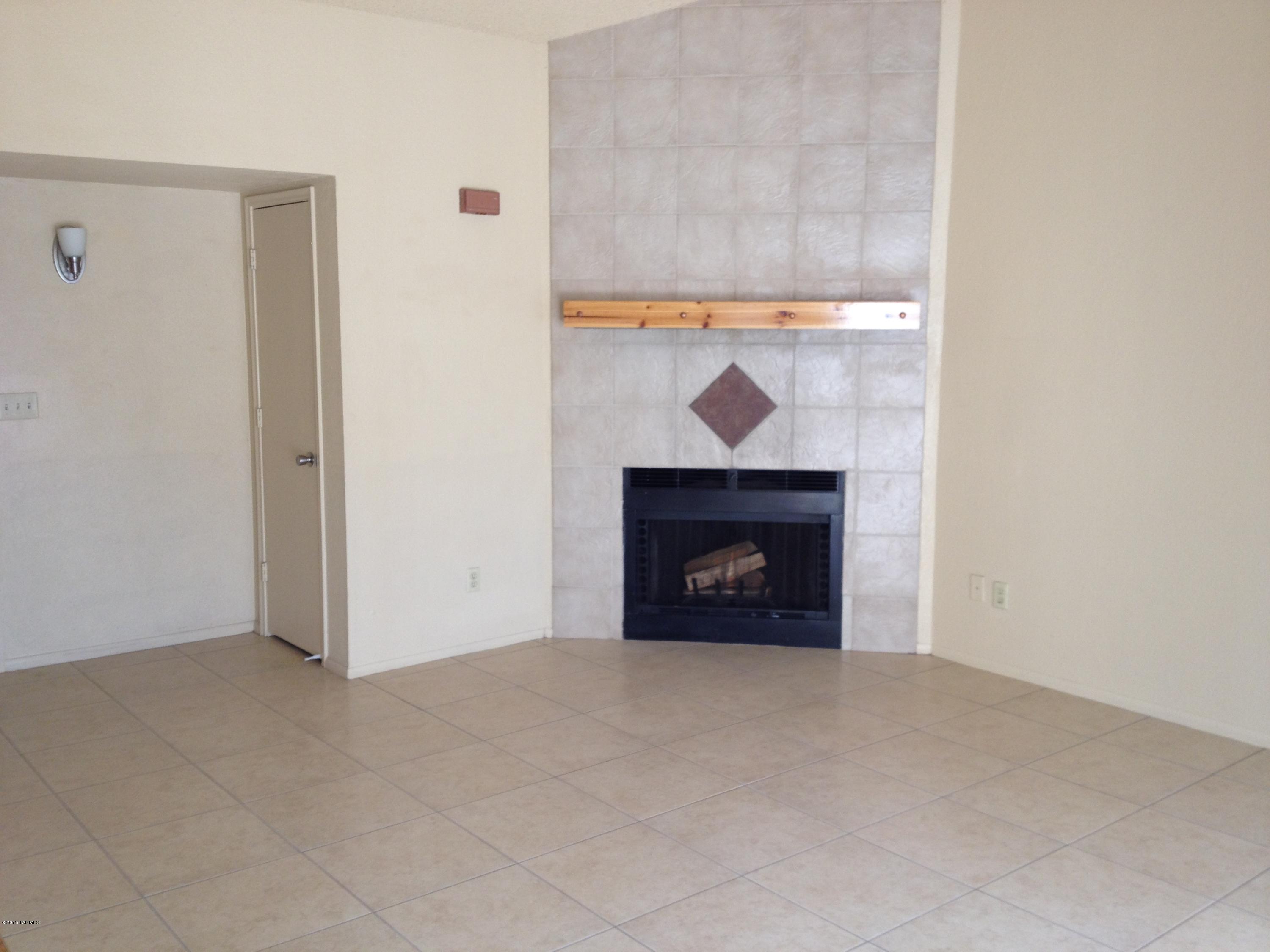 Beautiful Home ready for immediate occupancy. New ceramic tile, new carpet, decorative tiled fireplace in living room and much more.  Recently installed shingle roof, large fenced rear yard with storage shed, all window blinds stay.  Very conveniently located to shopping, buses and schools.