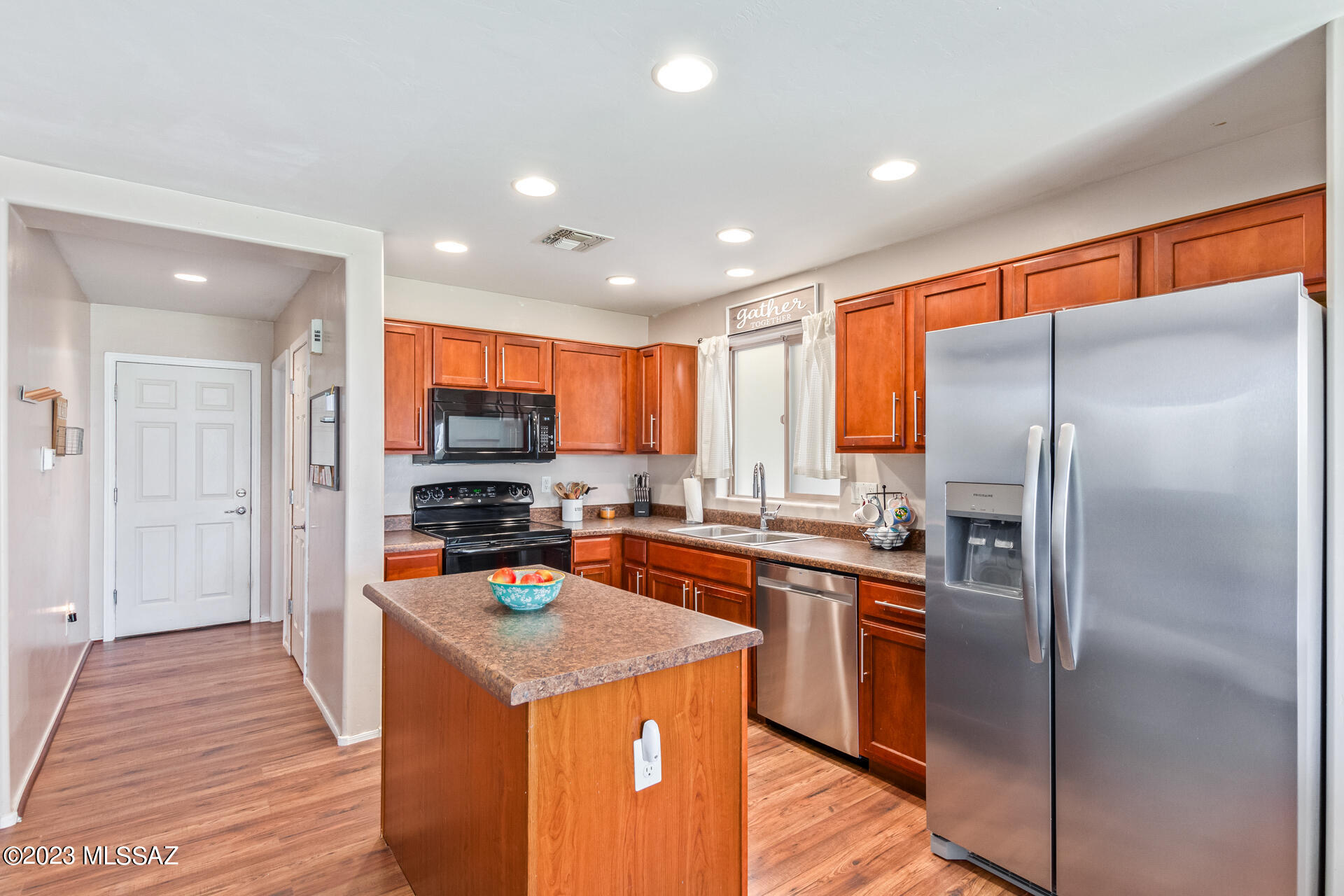 ***Seller to contribute $5,000 to buyers closing costs PLUS qualifies for USDA $0 Down financing! *** Nestled in a serene neighborhood, this 2-story home boasts an inviting interior that radiates warmth and comfort. Make an entrance onto wood-look laminate flooring paving the way to a charming great room perfect for relaxing or hosting. The kitchen is equipped with built-in appliances, including a brand new SS GE dishwasher, SS Frigidaire refrigerator installed in 2021, gleaming counters, cabinets including pull out drawers, modern recessed lighting, and a center island ideal for casual meals. A versatile loft awaits, ideal for a home office or creative space. The main bedroom offers a private bathroom featuring dual sinks, a shower/tub combo, and a walk-in closet. Windows contain solar solar screens for ultimate energy efficiency. Brand new HVAC system installed in 2023 and all ducts recently cleaned. The beautiful backyard promises endless fun and relaxation with its covered patio and synthetic grass backing to common area. Brand new community amenities include a park, basketball courts, baseball field, skate park & much, more. Don't let this gem slip away!