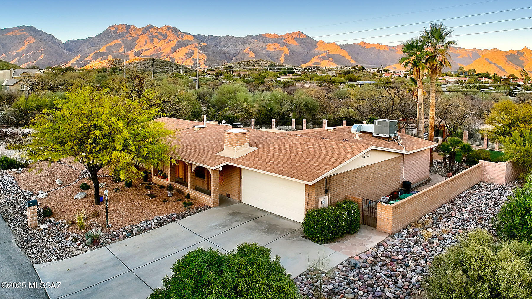 Welcome to paradise! This sensational updated home is located in the Catalina Foothills & offers everything you could be looking for in terms of upgrades, stellar mountain views, privacy & ultimate serenity. Luxury living that's designed for comfort & style includes updated chef's kitchen complete w/ extended height shaker style cabinets, quartz counters, stainless appliances & wine fridge, and beautifully remodeled baths. Additional features; vaulted ceilings, plank style flooring, new light fixtures, recessed lighting & fans. The backyard oasis offers panoramic views w/ no neighbors behind, pool, artificial turf & covered built-in BBQ area. Newer HVAC systems. Enjoy hikes out your back gate or a 5-minute drive takes you to Sabino Canyon Recreation Area. Schedule your showing today.
