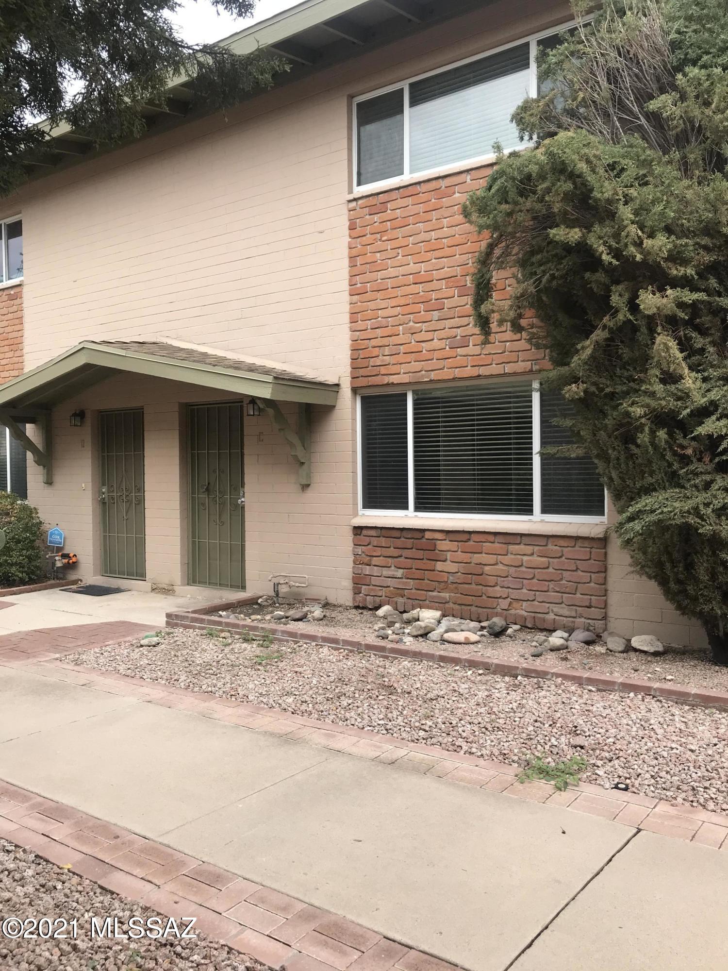 Central Townhome Beauty!  Spacious Downstairs Living Room that is light and bright.  2 bedroom/1.5 bath.  New flooring and paint.  Half bathroom downstairs with all bedrooms upstairs.  Back patio is fenced and subdivision has a Community Pool.  Please No Escalation Clauses and Submit Highest and Best Offer.
