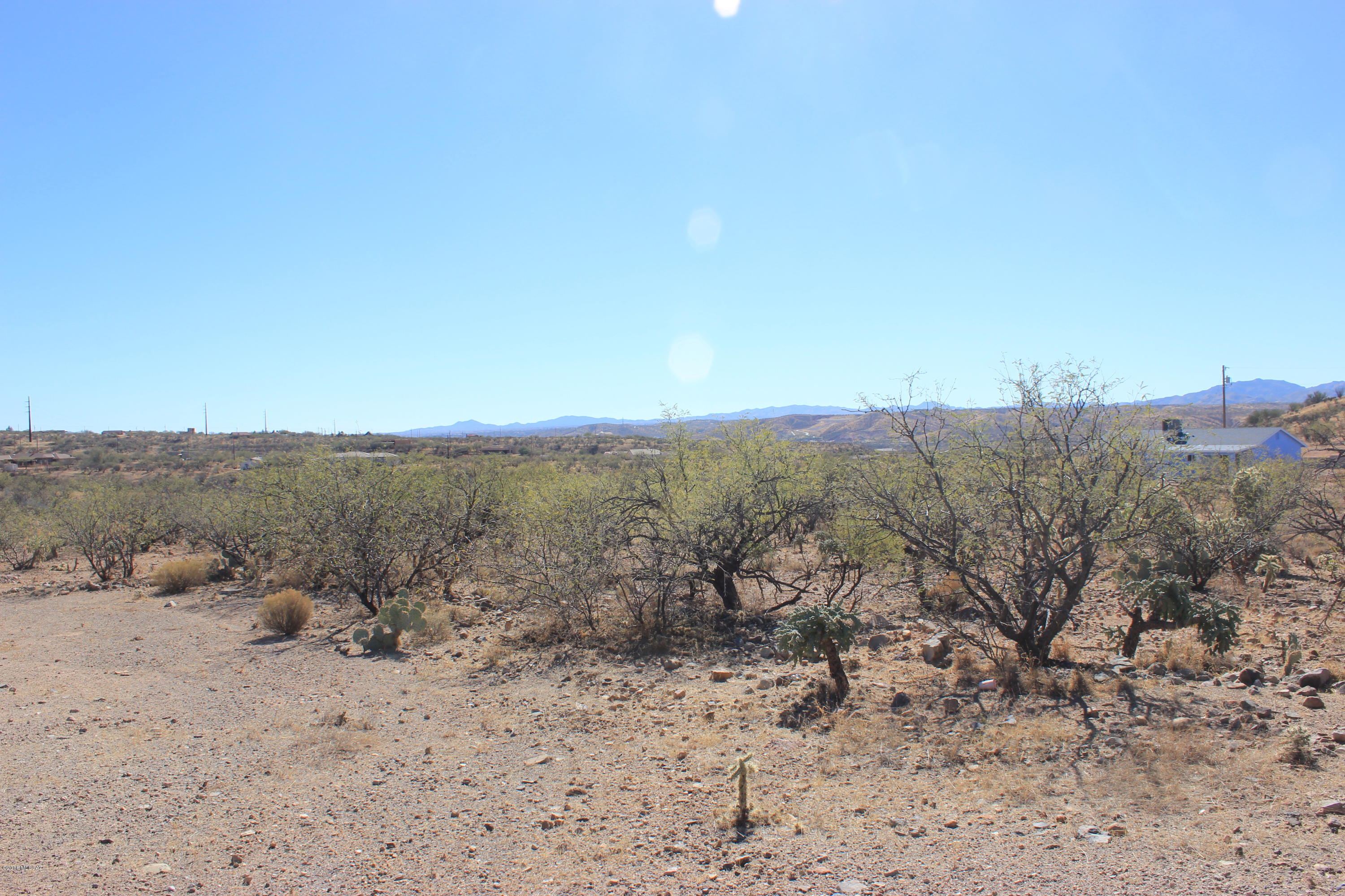 Residential building lot with terrific mountain views.  Road is dirt for about a three quarters of a mile.