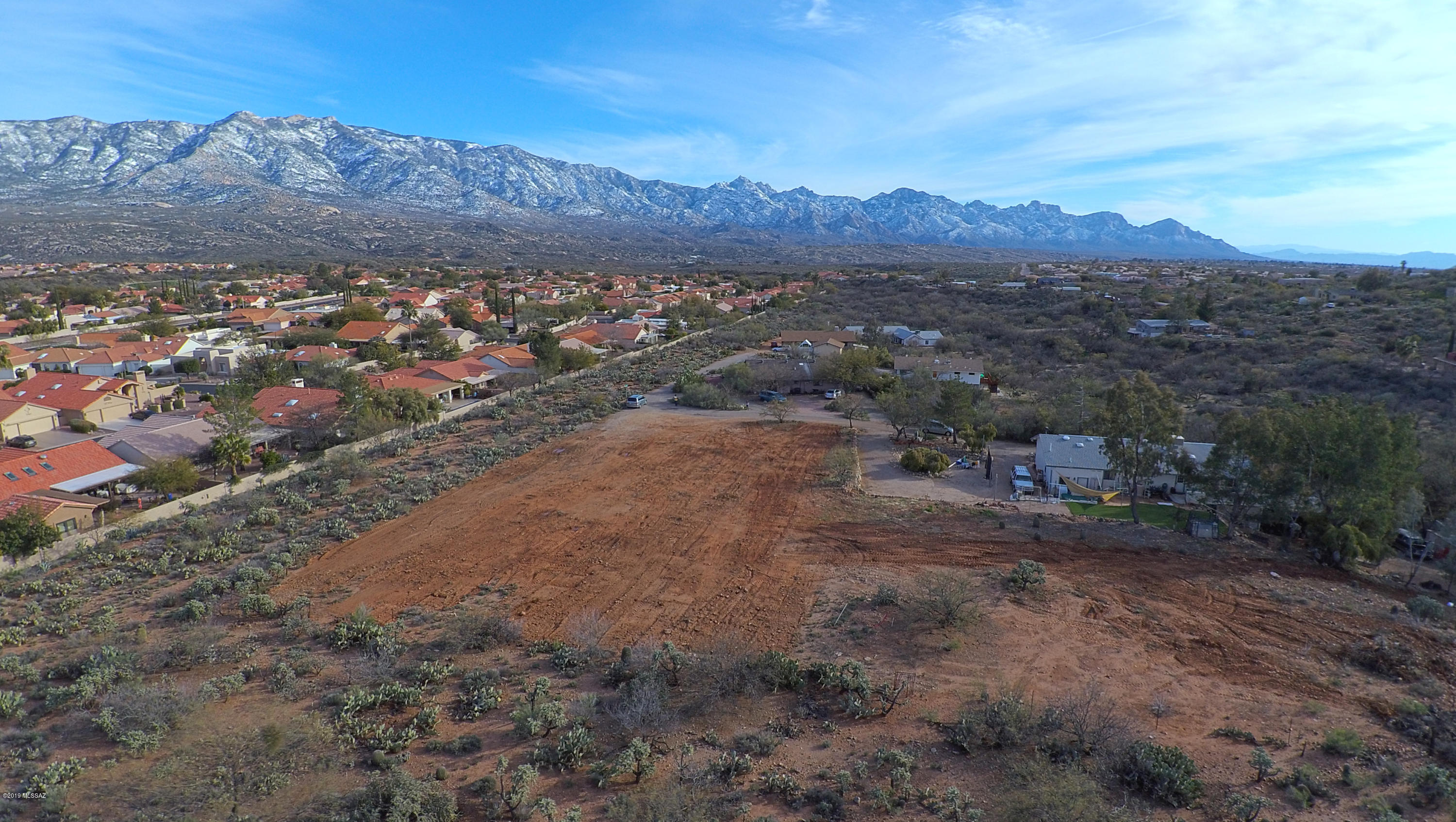 Beautifully graded 1.25 Acre land with front-facing eastern views of the Magnificent Catalinas!!! Certified Septic tank installed 2016 - Build the dream home you have always wanted on this premium lot! Zoned CR-3 (See Zoning ordinance in doc tab) No mobile/manufactures homes or livestock allowed.  Privately maintained street maintenance with a $16/month fee through Loma Serena Neighborhood Association. High Saddlebrooke comps with no Saddlebrook HOA fees! Come see this amazing plot of land awaiting its new owner!