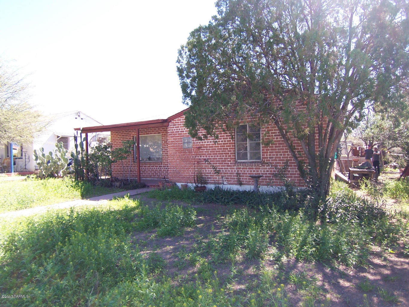 DO NOT DISTURB TENANT...This is a major fix up close to UMC and  UofA on a large lot.  Opportunity for a serious investor.