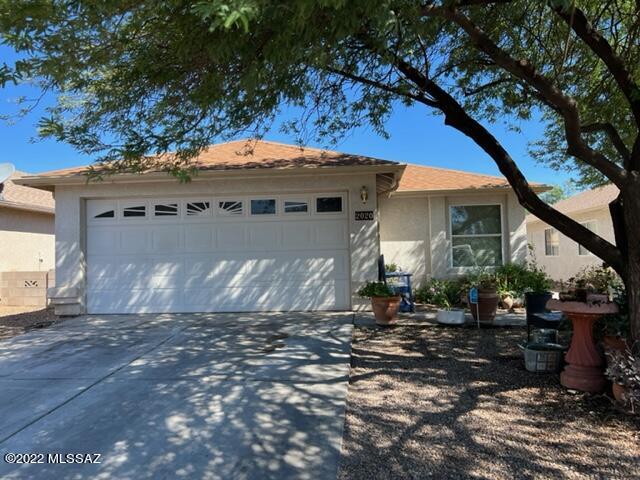 Tremendous value on this perfectly located family home.  Make a few minor updates to increase equity immediately.  This 3 bedroom, solar-powered home is the best value of the area.

Located on the Southwest side in the Paraiso neighborhood, and only minutes from the major shopping corridor along Valencia.  This quiet neighborhood offers quality living and a low association fee.  The entire interior is tiled for low-maintenance comfort.  The North-facing backyard offers a shady afternoon retreat from the Arizona sun.  Two built-in masonry planters frame the otherwise low-care backyard.  Installed solar panel system (over 9KW) keep energy bills low throughout the year.  The roof was replaced last year.  This home is perfect for first time buyers or investors.  3rd bedroom has no closet.