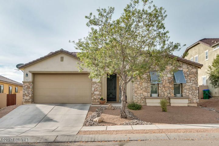 Location, Location, LOCATION! Immaculate well-maintained 4 bedroom home loaded with upgrades, located on a FABULOUS VIEW lot with NO REAR NEIGHBORS, desert behind and great mountain views. You'll love the light tile floors that flow throughout this home. No carpet to be found! Formal living and dining makes an ideal space for a pool table and entertaining area. Open and airy family room flows into the nook and kitchen. Gourmet kitchen features Corian counters, raised panel hickory cabinets, gas cooktop, double ovens and stainless appliances. Spacious master suite is pure luxury with access to the backyard. Master bath offers a separate soaking tub and shower. The backyard is made for entertaining! You'll love the BBQ island, fire pit, hot tub and several seating areas. Close to everythin