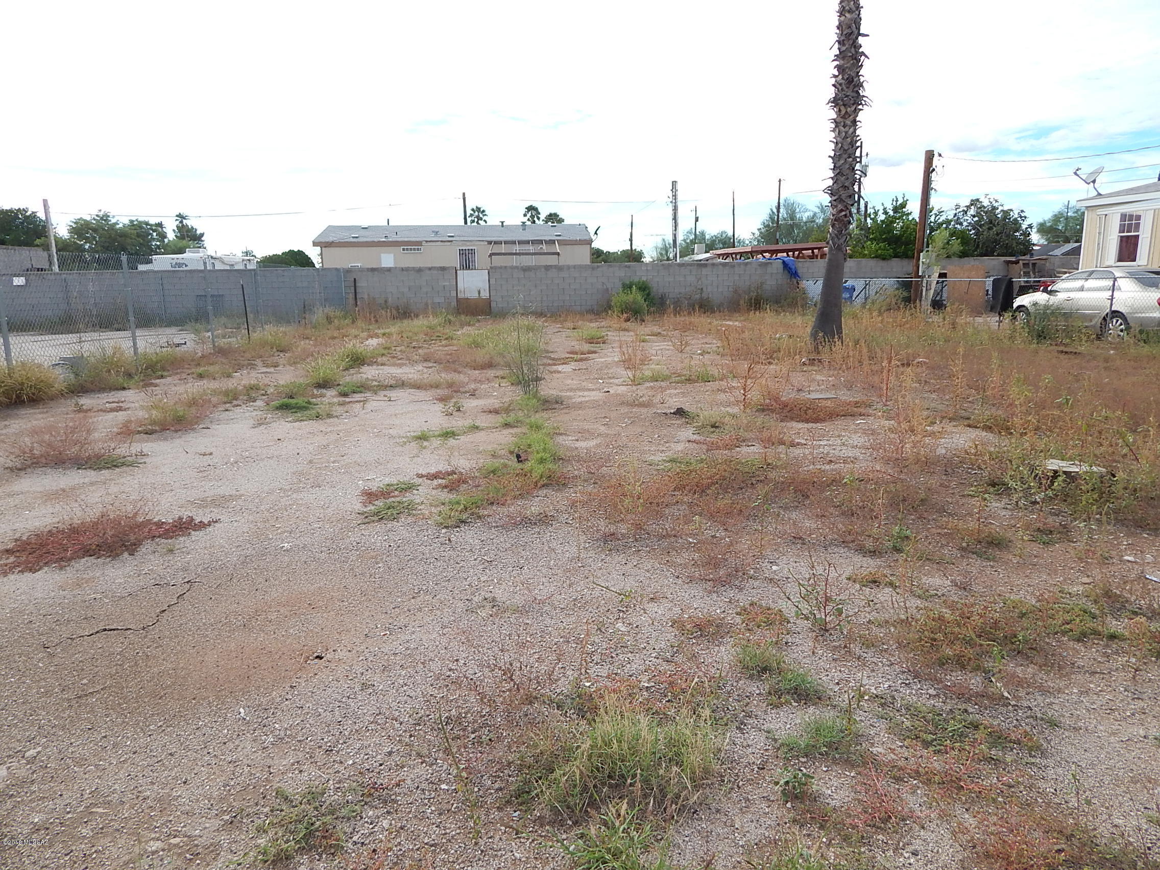Flat and usable. There was a mobile home here at one time so there should be utilities. Buyer to verify all aspects of this listing including viable utilities, septic, etc.