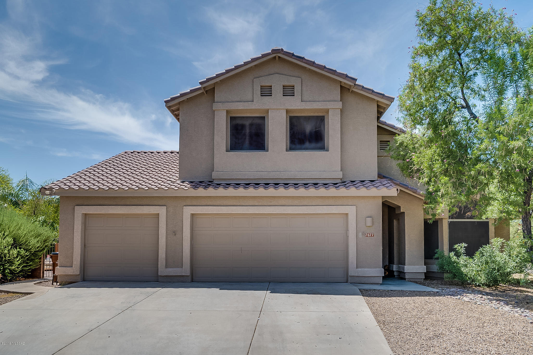 4 bed + 2 den & 3 bath home with Back yard oasis with Set on a cul-de-sac with beautiful mountain views! Three car garage, zoned A/C with upgraded seer, and vaulted ceilings and has Solar panels. Attractive laminate wood and ceramic tile set on the diagonal in all the right places. The amazing kitchen boasts of ample white 42'' cabinets, lots of counter space, breakfast bar, large pantry, a kitchen nook . This home includes two dens that are downstairs- one off of the hallway and the other off of the living room which has a closet and can easily be converted to a bedroom. The back yard is a beautiful with covered patio, grassy area, immaculate pool, and incredible mountain views. Home has solar. This home is a must see!
