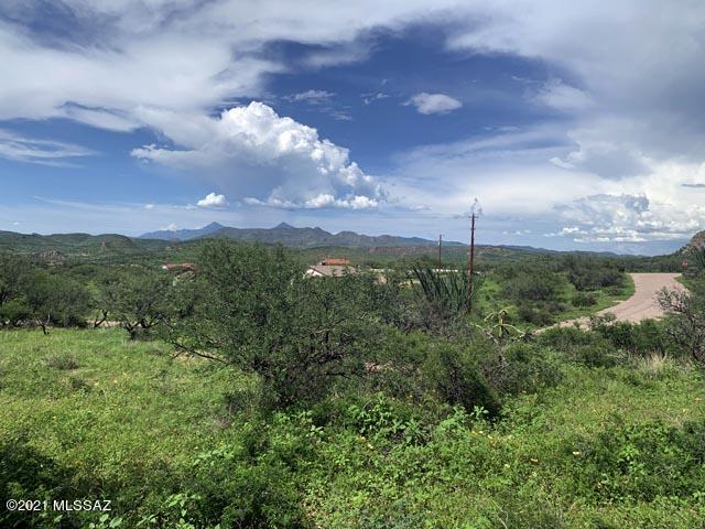 Location, location, location. This one-acre vacant lot sits high on the mountainside and affords magnificent 270º sunset views to the West towards Baboquivari.