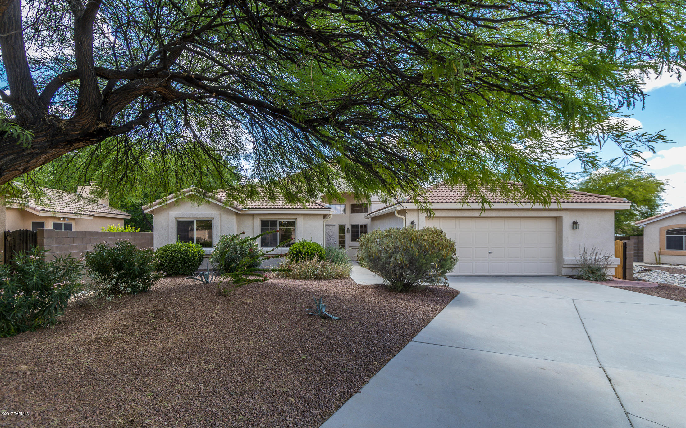 Come see this fantastic 4BR/2BA Pepper Viner home on an oversized lot at the end of a quiet cul-de-sac! Home is filled with light from extra windows throughout, but keeps its cool due to all the shade from the mature trees in front and back. High vaulted ceilings in great room and Master give a feeling of even more space. Fresh paint throughout and newer carpet make it move-in ready. Security screen door, security system, oversized garage! Neighborhood gate to Bloom Elementary School.