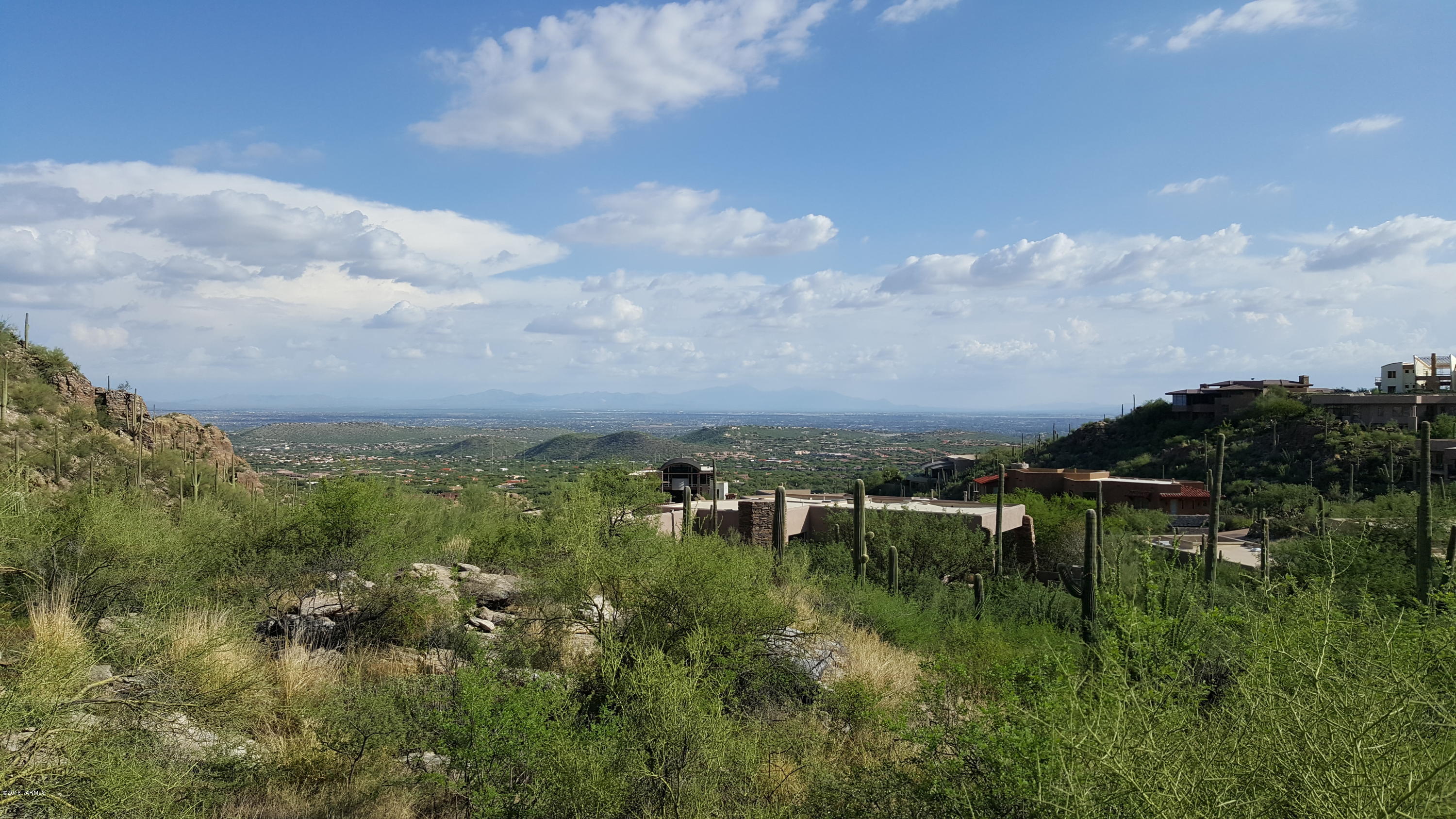 Excellent .83 acre view lot high above the city in prestigious Ventana Canyon Mountain Estates. With rolling topography, 360 degree city and mountain views, lush desert vegetation and privacy, close to shopping, the Ventana Canyon Resort, golf, tennis, The Lodge at Ventana, Loew's Ventana Canyon Resort and hiking and biking trails, this is an ideal lot for your dream home.