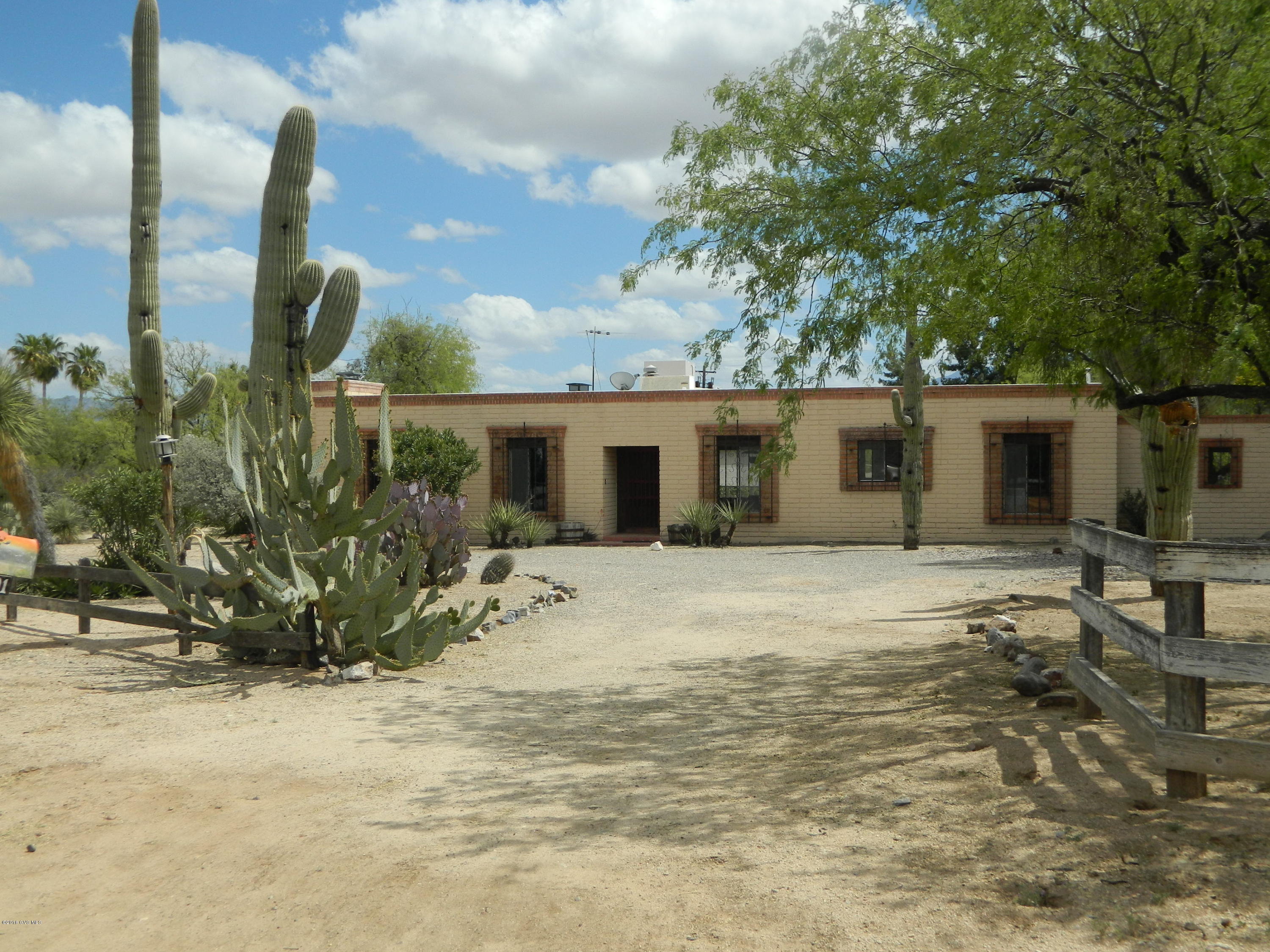 Unique Betty Hazen Home on Over One Acre. No HOA. Old World Charm. Two Fireplaces. Wood Beam Ceilings. Authentic Wood Doors. Three Bedrooms, Jack and Jill Bathroom. Circular Driveway. Mature landscaping. Water Feature in Backyard. Storage Shed. Horse Property. RV Parking Area.