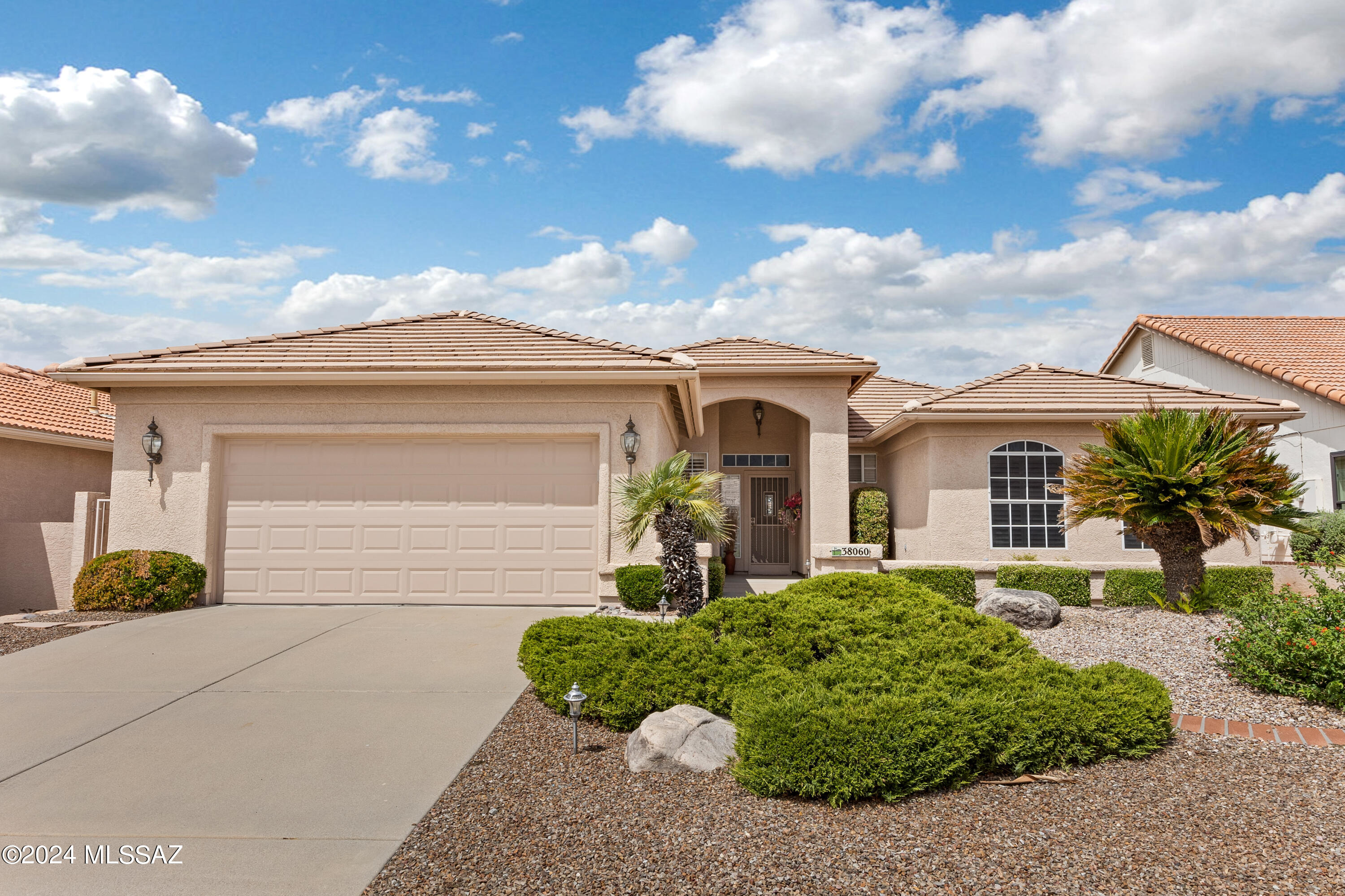 Bring your suitcase and settle into this stunning, turnkey Madera home perched high above the golf course in the desirable SaddleBrooke community. This beautifully maintained home offers breathtaking golf course and sunset views, creating the perfect backdrop for your new lifestyle. Inside, you'll find a home that's move-in ready with all furnishings included making it easy to start enjoying your new space right away. The home features an extended patio with a ramada, ideal for outdoor entertaining, and a host of upgrades including a newer stainless steel refrigerator, updated HVAC system and elegant plantation shutters. Located in vibrant SaddleBrooke, you'll also enjoy access to a wide range of amenities, ensuring that every day feels like a vacation. Call and schedule a showing today!