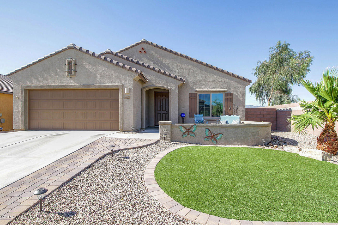 Absolutely stunning 2 bedroom, 2 bathroom home with a Den in Del Webb. Den is fully wired and currently a home theater!  You will fall in love with this open and bright floor plan. Looking for your dream kitchen? Look no further! Granite countertops, extended island, pendant lighting, upgraded cabinets, tile backsplash, recessed lighting, gas range stove and wet bar. Beautifully landscaped back yard with covered patio, built-in BBQ, fire pit, hot tub and dog run. Gated community pool, spa, recreation center, tennis and other wonderful amenities. Meticulously maintained and move-in ready!