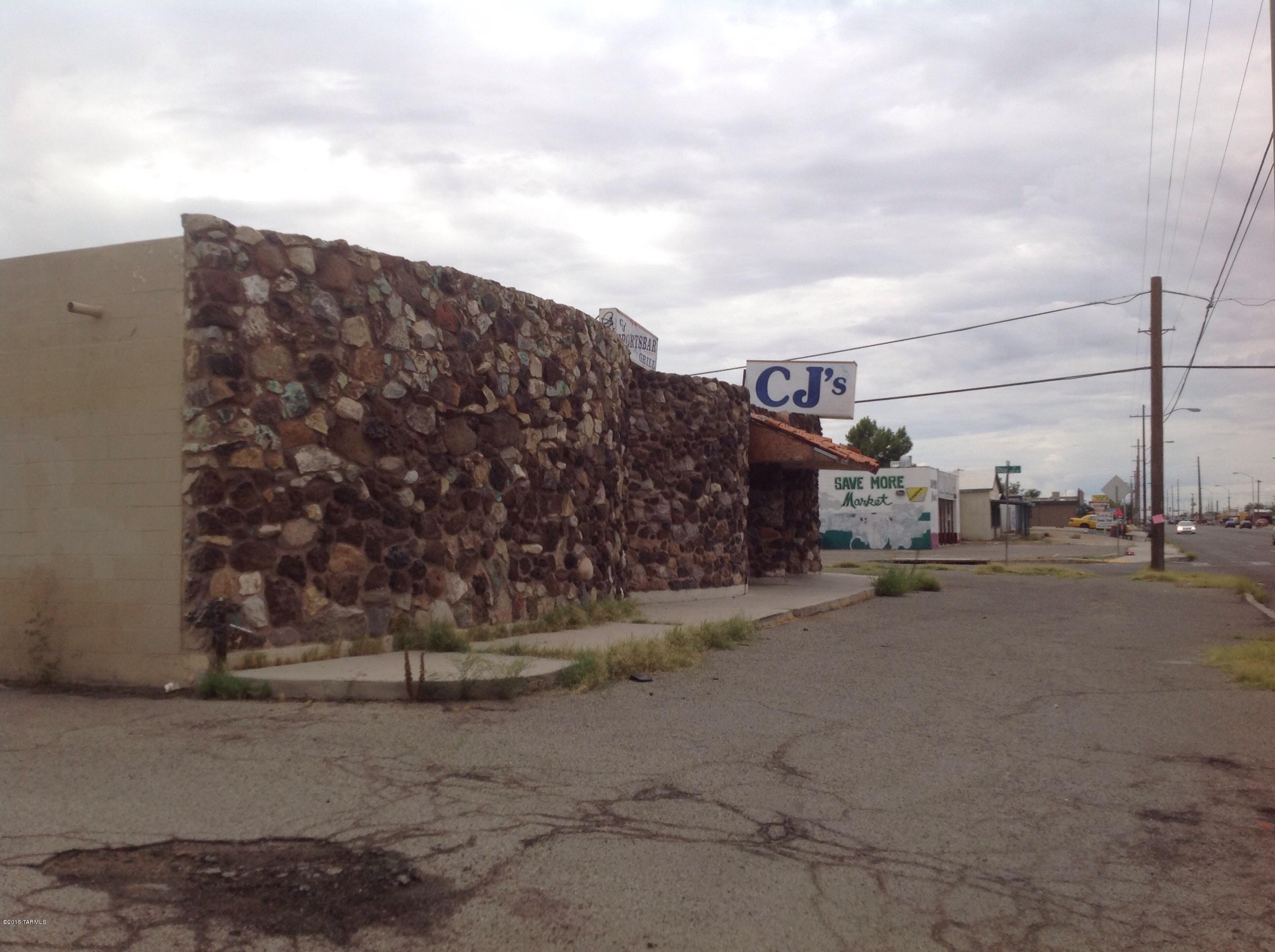 Former restaurant/bar,  4475 sf plus a caretaker or rental home of 1003 sf.  Lots of potential, but had a fire so repairs needed.  Includes parcel lot 120-08-0880 for additional parking.  .52 acres with both lots.