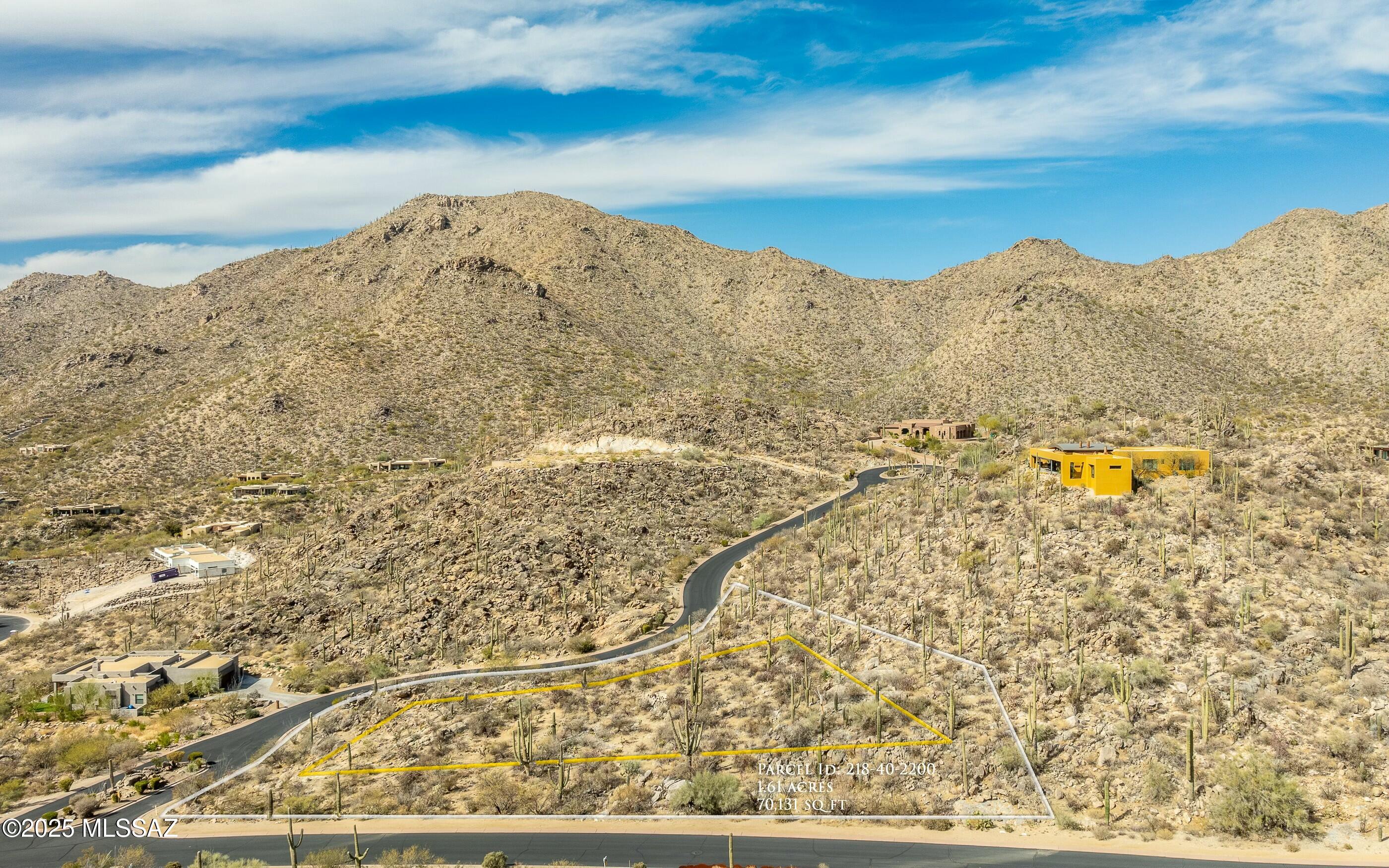 Exquisite Tortolita Mountains & endless canyon views from this peaceful yet showy custom lot in guard gated Canyon Pass at Dove Mountain. Canyon Pass is home to some of the most beautiful and unique custom homes in NW Tucson. Dove Mountain is home to Icon golf courses, endless hiking trails and nature & wildlife abounding. This is a fabulous lot- ready to be built on - easy to medium site prep.  Very spacious building envelope. Easy access to property. Your own little 'corner island' custom homesite.