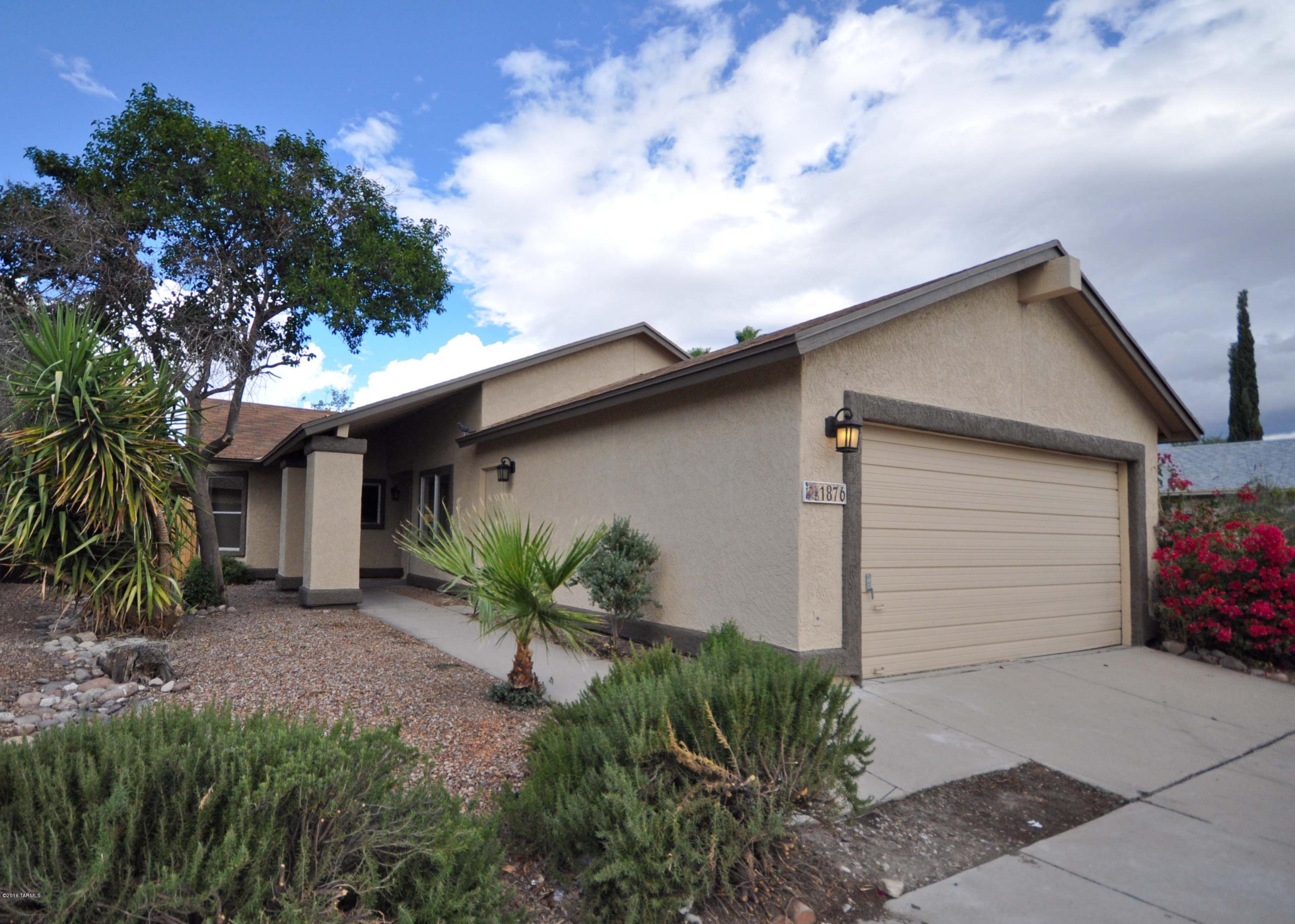 Beautifully remodeled home with all new espresso cabinets, granite countertops, oversized tile, carpet, and SS Appliances. Enjoy updated contemporary bathrooms with new vanities, granite, and tile surrounds.  Home has been freshly painted inside and out. Convenient walk to community park and pool. All this house needs is a buyer to call it home. Members of selling LLC hold real estate license.