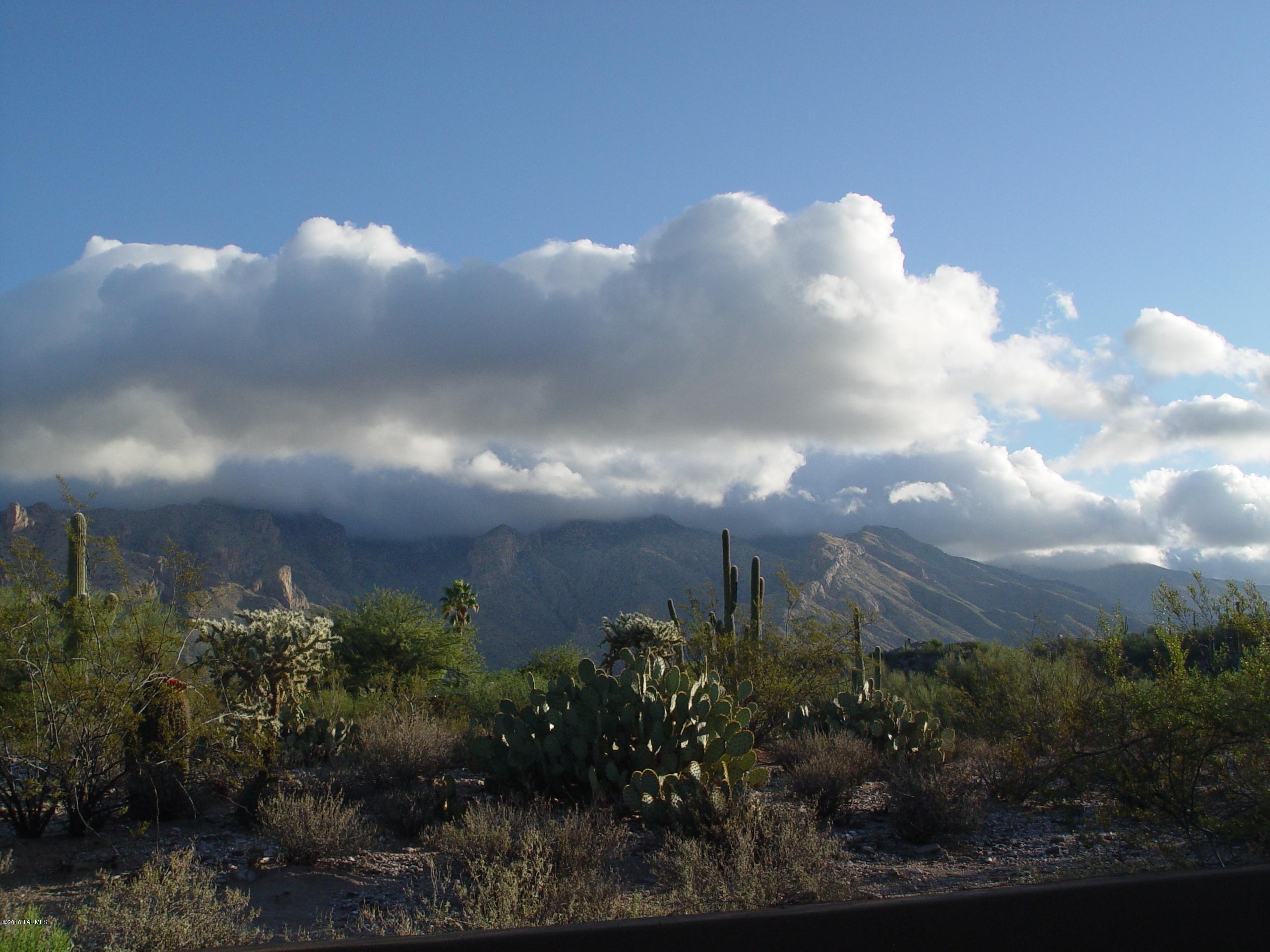 One of the original lots in Catalina Foothills No.6. This 1.41 acre lot has wonderful mountain views and possible city views on a very quiet street close to La Encantada, University of Az, Banner Medical and in District 16 School District. Come and see if it could work for you!