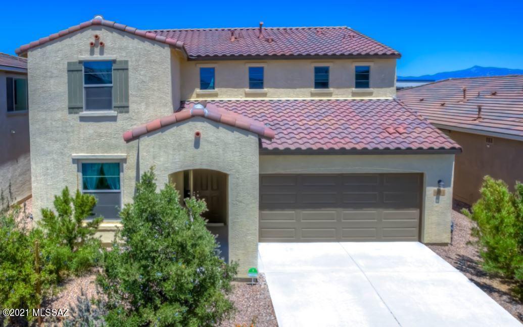 Welcome home to your spacious 2,743' Meritage home located in the award winning Vail School District.  4 bedroom/2.5 bath + an office + a loft, this home offers plenty of flexible space.   The main floor features a large great room with an upscale, open kitchen and dining room. The kitchen boasts a large island, tiled backsplash, walk in pantry, countertop extension with upper cabinets and a built in desk.  Off the foyer is an office space that can be transformed into a fifth bedroom, if desired.  At the top of the stairs is a generous-sized loft space and three additional bedrooms including the master retreat.  There is upgraded tile and luxury vinyl throughout the home and a soft water and water filtration system. Located in the highly desirable La Estancia community where you will love the great selection of schools available within the sought after Vail School District.  La Estancia has direct access to 'The Loop', an interconnected system of more than 120 miles of paved pathways and bike lanes, as well as a community pool, basketball court and several beautiful parks.  La Estancia is within close proximity to many major employers, including Davis-Monthan AFB, Tucson International Airport, UA Tech Park, Raytheon and Amazon. Come see this gorgeous home today!