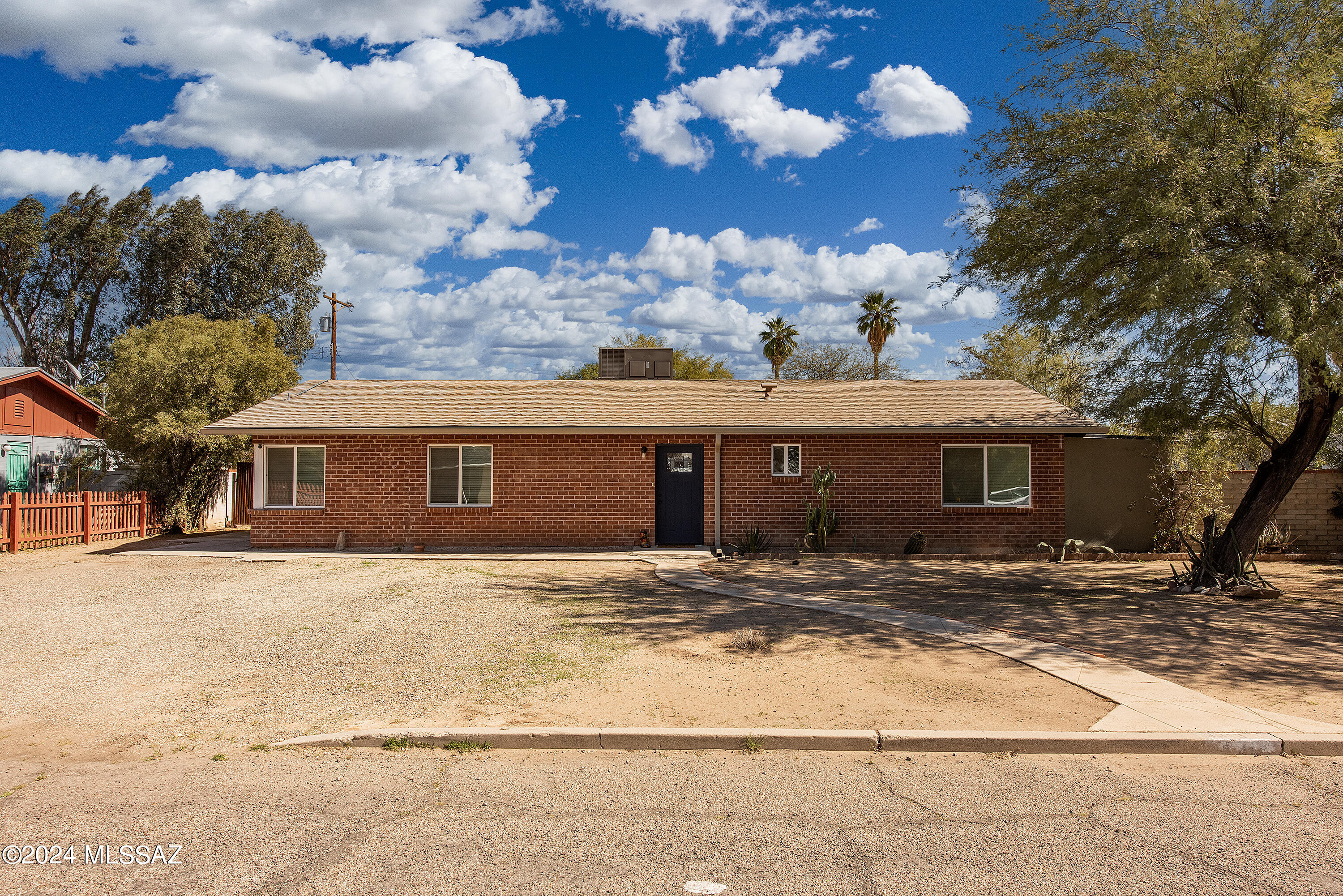 This perfectly updated and maintained to perfection double red-brick home has been fully remodeled with modern, quality finishes! Featuring a wide-open floorplan with a massive great room that's open to the sprawling kitchen, this home comes complete with recent AC, water heater, plumbing, electrical and more. Granite countertops, stainless steel finishes, an interior workshop, and a bonus area are just a few of the features that are normally found in much more expensive homes. Solar system must be assumed. The master bedroom features a huge walk-in shower with built-in shelving, designer shower finishes, and lots of natural lighting. The large laundry room has built-in shelving that makes washday chores so much easier. The very large fenced-in backyard features two large entry gates.