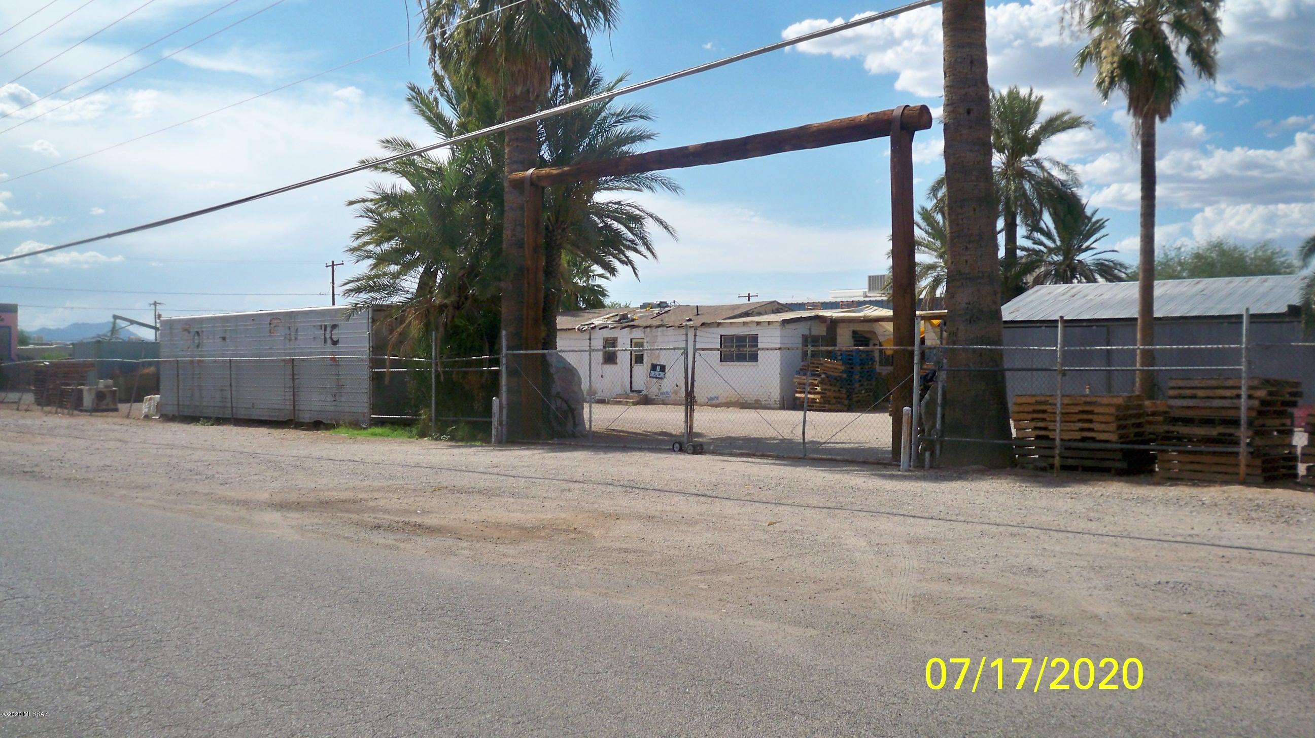 Zoned Light Industrial, I-1 in the south central corridor of Tucson near Downtown,  located in an Opportunity Zone with tax advantages!  Located just off Park Ave and 22nd St, a close to all major roads and Interstate I-10.   Visible corner location with distinguished palm trees on the property, plenty of space for equipment and vehicle parking, there is  1200 sq ft metal building with a concrete floor for machinery and daily operations.  In addition, the property contains an older residential building, with 1287 sq ft  ( circa 1948) that may be more beneficial to demolish  for more  industrial space. Only two improvements will be conveyed with this property, The metal industrial building and the older 1948 residential  structure. Note that two parcels will be conveyed in this transaction.
