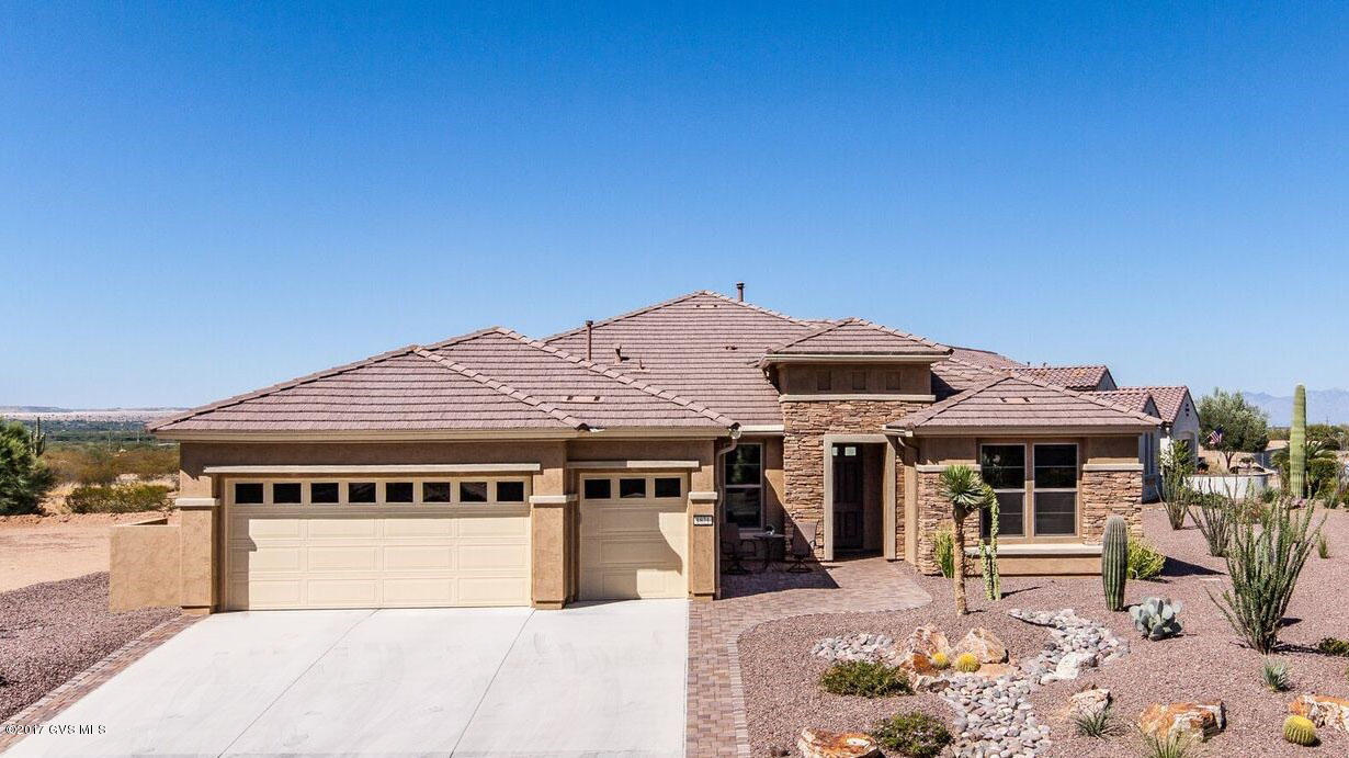 Exceptional 2-year old executive home in gated golf community, Quail Creek. Over 2500 square feet, this spacious Sonata model includes 2 BR / 3 Bath plus den and a versatile hobby room or exercise retreat. Dream kitchen includes; Beechwood 42 cabinets, designer tile backsplash, premium gas cooktop, convection oven, stunning granite. Generous master suite with master bath spa oasis; jetted tub, elegant shower and extended walk-in closet. Your guests will love their own private bedroom suite. Extended garage/decorative chip epoxy floor, overhead storage, and a golf cart garage.Upgrades throughout, including energy saving features,2x6 construction,theater system, extended paver stone patios, jacuzzi, firepit. Pre-wired for pool/ casita. A fraction of the time, effort or cost to build new!