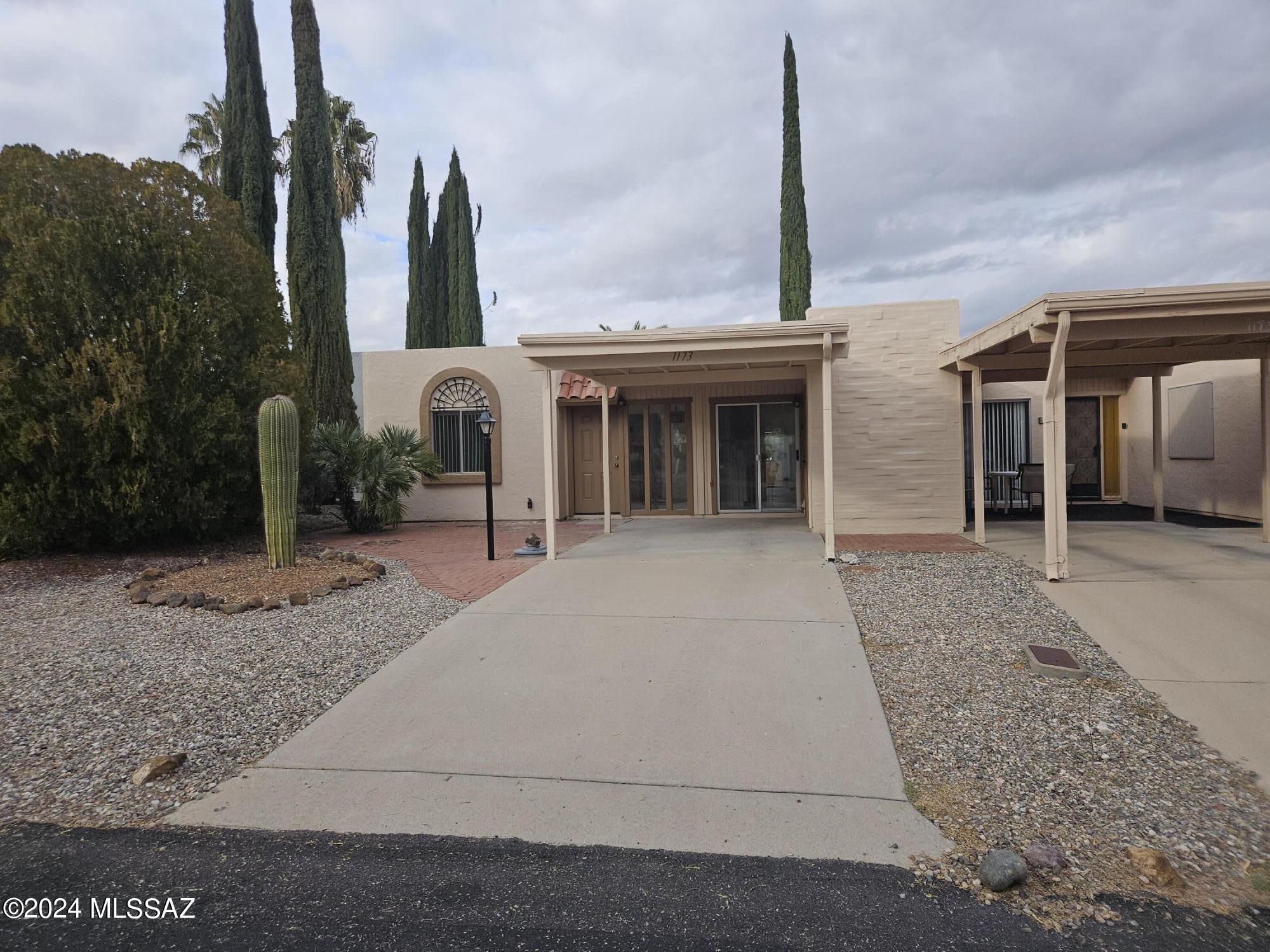 fresh paint, all new tile flooring and granite countertops in kitchen.  lots! of storage. covered patio out back and additional patios front and back. Ower/Agent