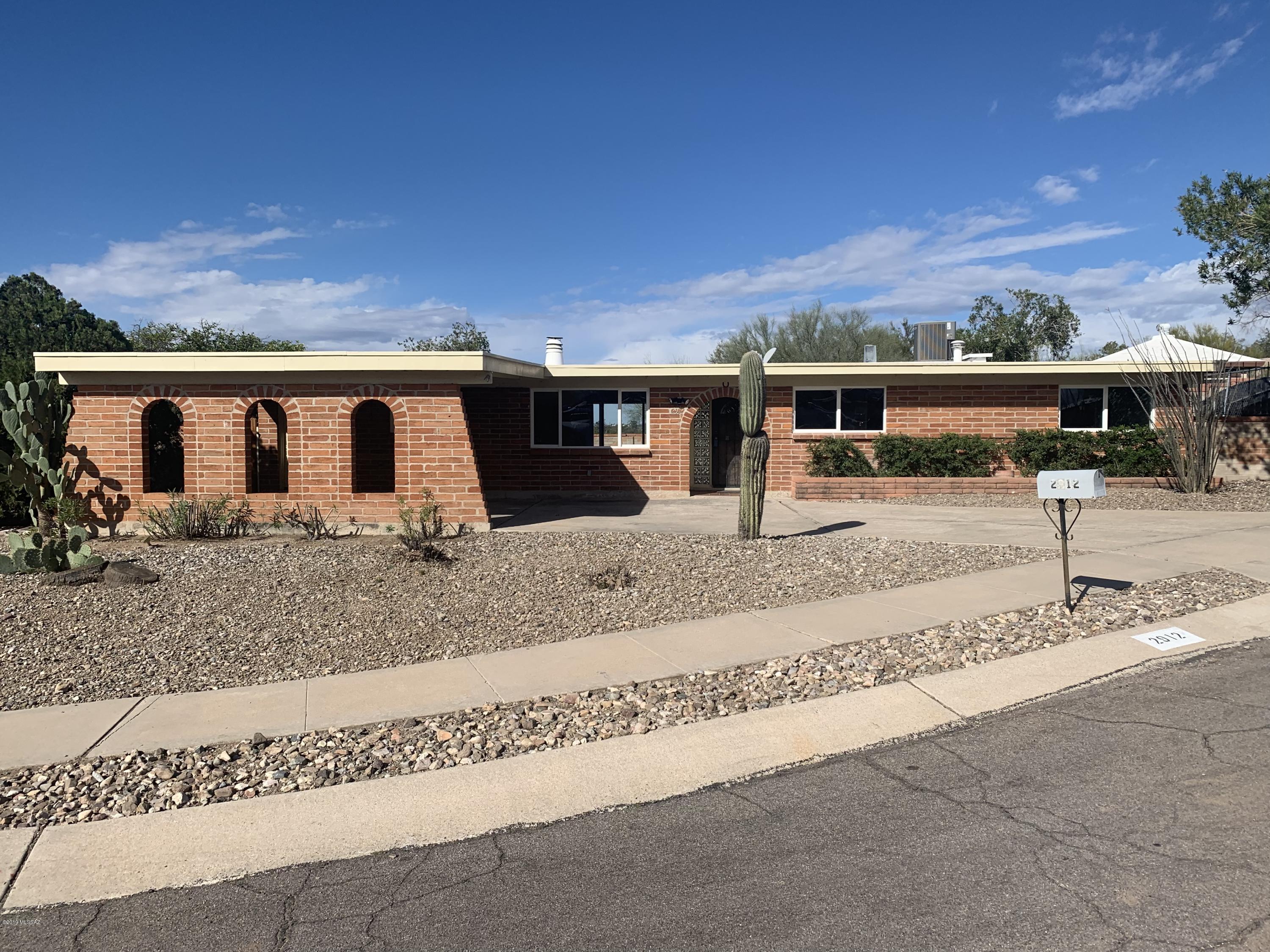 Sellers are licensed real estate agents in Arizona.  Private cul-de-sac lot. 1780 sf home with 3 bedrooms/2 bath, 2-car carport and POOL. Upgrades give this popular floor plan a warm, open, light and bright feeling. Lots of new windows, New interior paint, New light fixtures, bath showers are beautifully done, upgraded interior doors, ceramic and wood floors. Spacious kitchen has center island, lots of cabinets, beautiful countertops, space for garbage can & large eat-in area.  Great room feeling has a huge living room and dining area. Newer HVAC system, relaxing back yard with sparkling pool and couple of storage sheds in a separate yard. Don't wait and bring your contract with you.