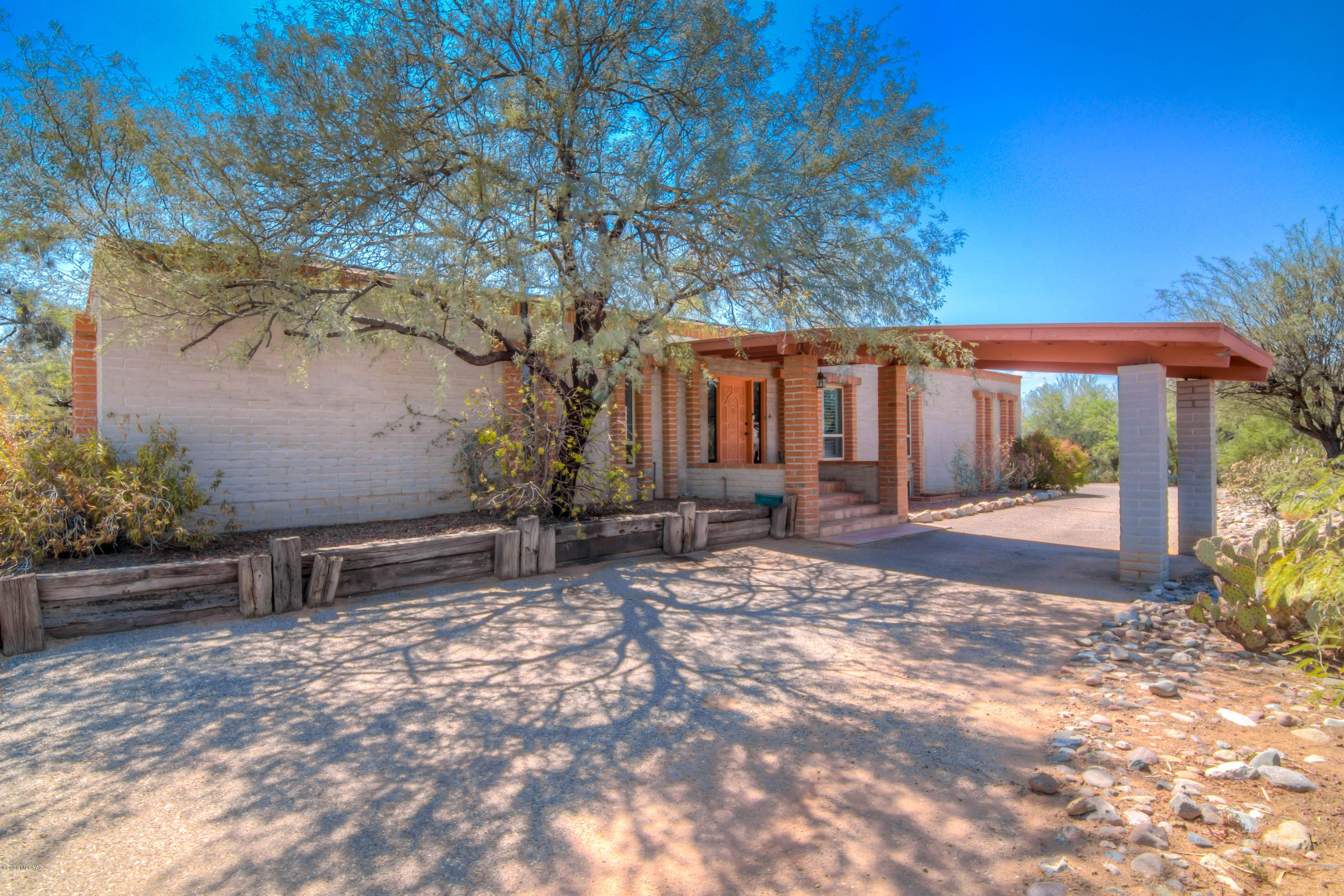Situated on 1.53 acres, this beautiful horse property features 3 bedrooms and 2 bathrooms. All rooms include walk in closets. An updated full basement which includes a fireplace can be an extra bedroom or living space. A relaxing pool and spa with built in entertainment area greets you in the fenced back yard. Just beyond that is a full horse facility including two stalls, a tack room, a wash stall, corral and arena. The attached guest house includes a kitchen and bathroom accessible from the basement or via the separate guest entrance. The possibilities are endless with this home. Centrally located in the heart of the Northwest, this home is sure to meet all your needs and more. Call for a private showing today!