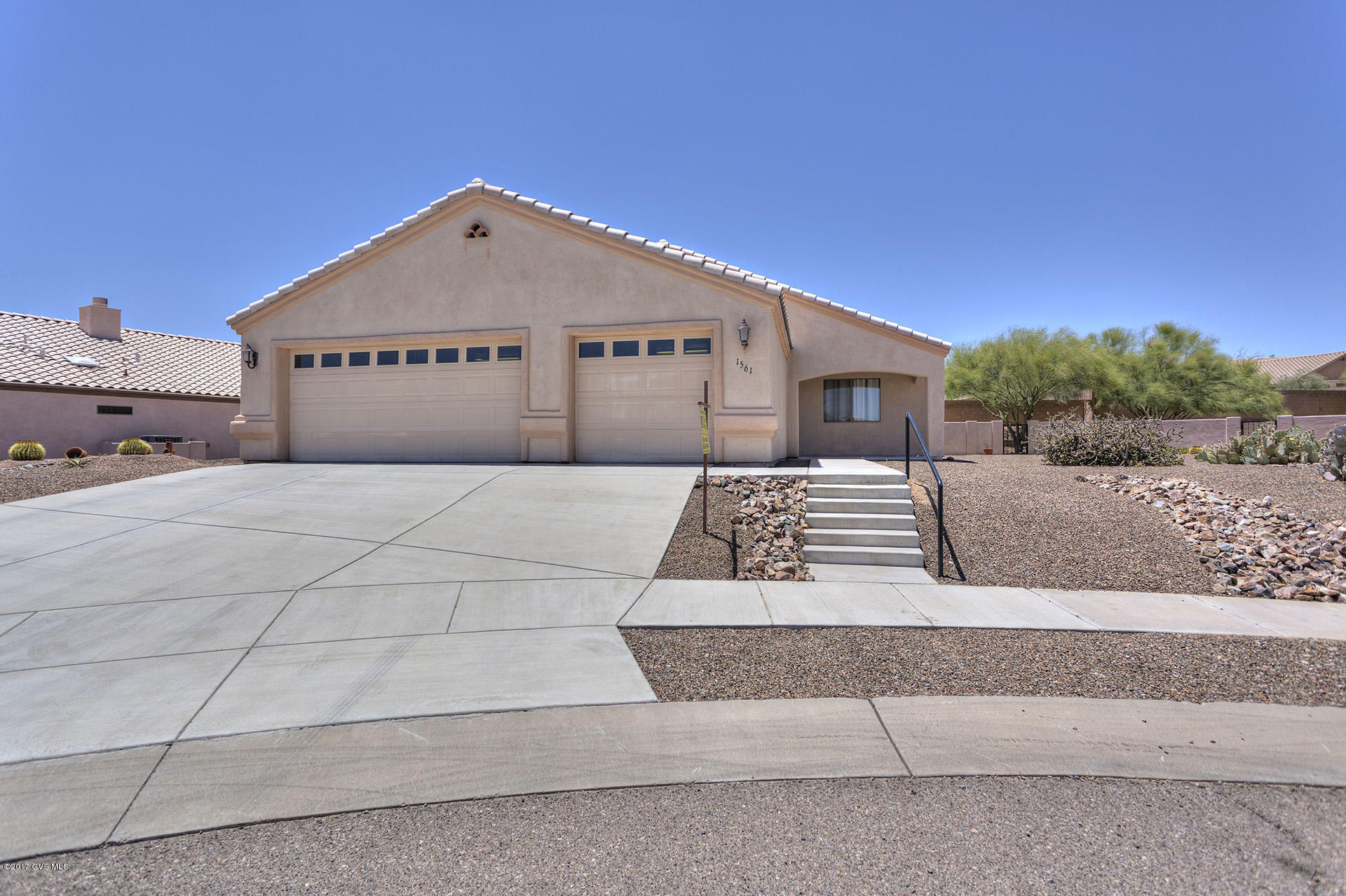This spacious, 3 BR 2 BA home in 55+ Desert Creek offers 1,870 sq.ft. of living space, a large open concept kitchen and great room with gas fireplace, and both formal and informal dining areas. Master bedroom has walk-out to large covered patio. Master bath boasts an oversized walk-in/roll-in tile shower, dual sink executive height vanity and oversized walk-in closet. New carpet in all 3 bedrooms and closets. Ceiling fans in great room and all bedrooms. Laundry room is complete with ample storage and wash basin. 3 car garage has bonus storage room with water softener loop. Gas stub behind range. Large cul-de-sac lot with low care landscaping. Built by Figeroa with 2x6 construction.