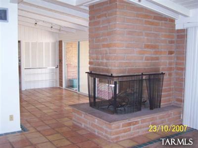Charming red brick 1950's home on large lot w/5 bedrooms & 3 bathrooms, this home boasts 2 kithcens, huge rear yard, enclosed fence and so much more