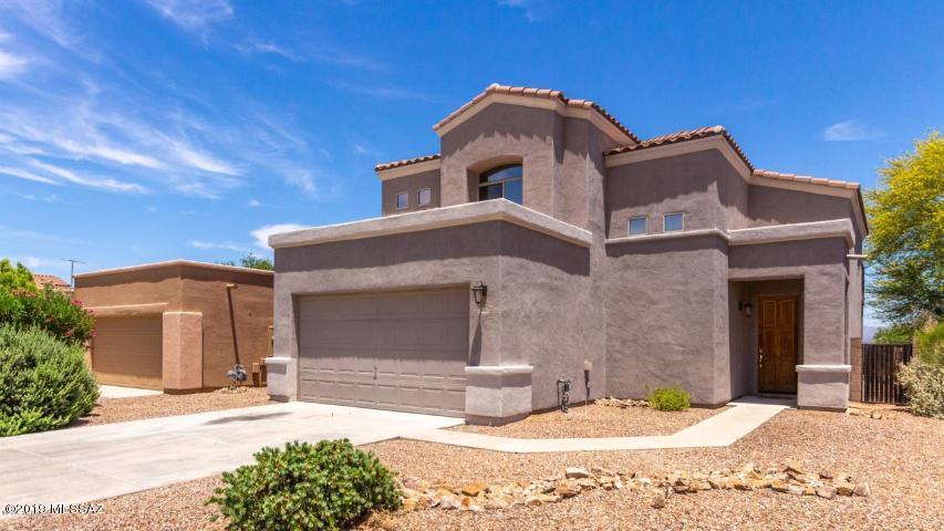 Nestled in La Joya Verde is a well kept 4 bedroom, two-story home! Charming curb appeal welcomes you to soaring ceilings with an abundance of natural lighting and spectacular views from any room in the house. Open great room off the kitchen creating ample entertaining space with tile flooring and neutral color tones. Oak cabinetry with black appliances and a breakfast bar creates this space. Upstairs is the elegant master with a walk out exit to your private patio with unobstructed mountain views! Enjoy time outdoors in your spacious yard taking in the ambiance. Make this your home today!