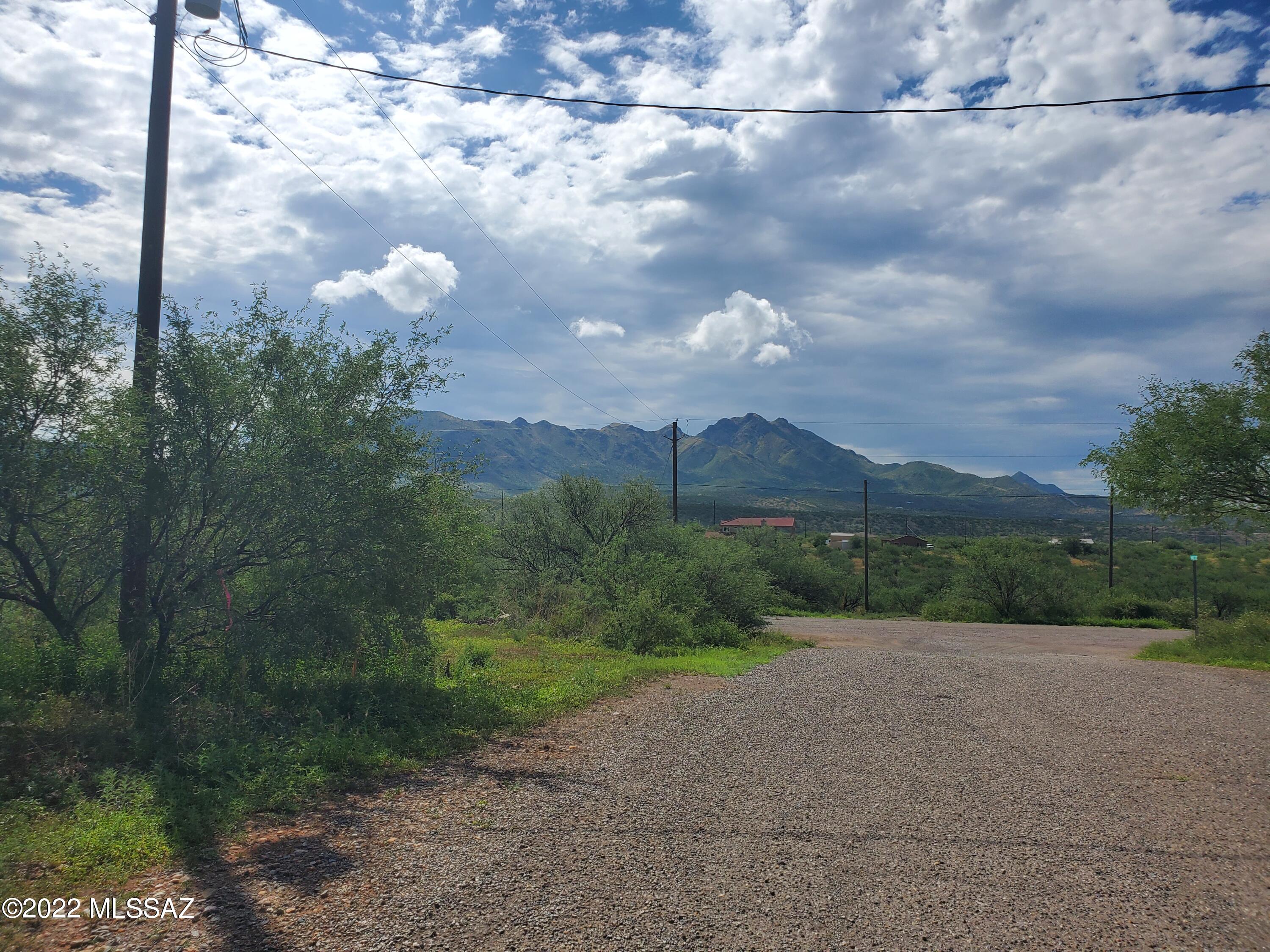 Beautiful flat lot with gorgeous views.  Electric appears to be at the street; however, should be verified during inspections along with water.  Water inquiry submitted to Liberty Water.  Near shops, schools and the interstate.