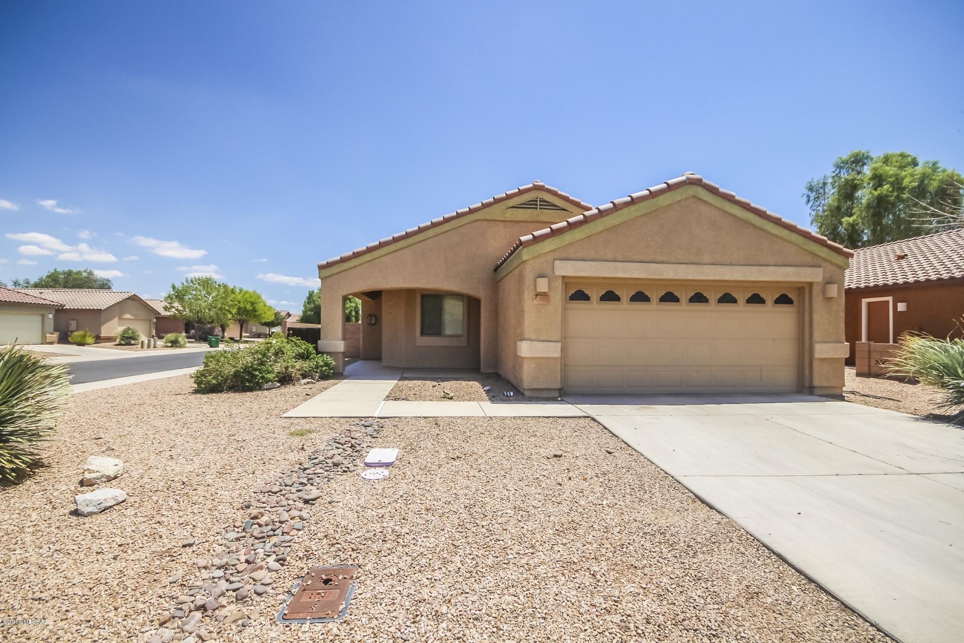 Move in ready 3 bedroom / 2 bathroom home in the highly desirable Gladden Farms Community. The open floor plan features neutral paint and vaulted ceilings throughout! The spacious kitchen features beautiful wood cabinets, all kitchen appliances and eat in nook! The master bedroom features an en-suite with dual vanities, private toilet room and walk 
in closet. This corner lot features a large back yard with covered patio for those amazing family gatherings! In addition to the 2 car garage, the property also features an RV gate to the backyard. This home offers a community park with playground, easy access to the I-10 and much more! This will not last!