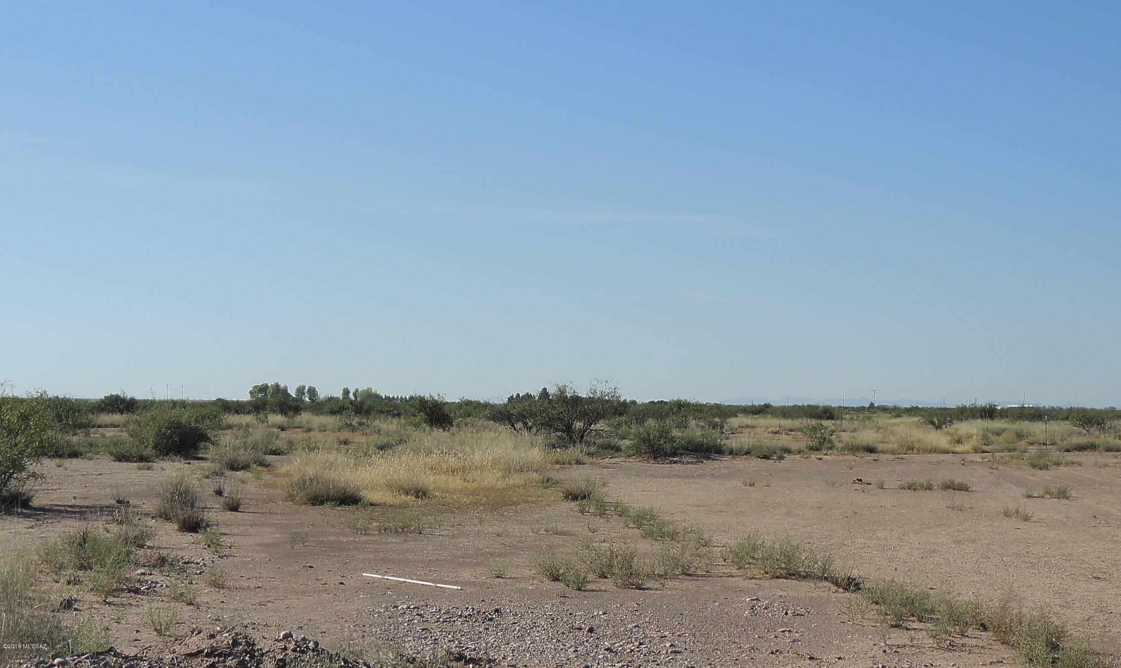 Approx 81 acres on Whitewater School Rd, just south of Elfrida.  All level and fairly clear.  60 +/- acres with irrigation rights.  Authority number 60-203175.0001  Two wells, 55-620826 and 55-620827