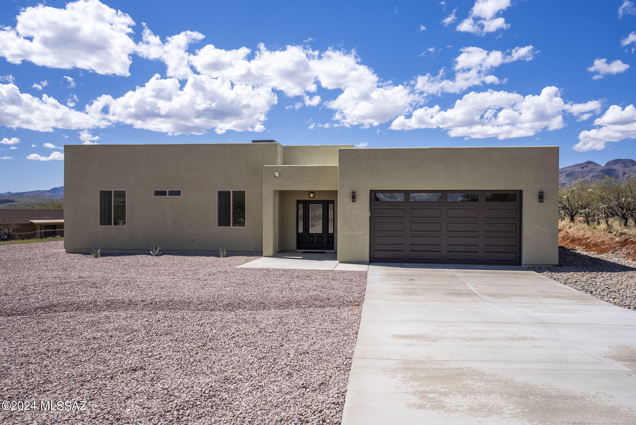 Seller concession offered to the buyer so you can buy down the interest rate on your new loan.  Custom home under construction.  3 Bedrooms and 2 baths with large kitchen with 8 ft. island, Quartz Countertops in kitchen and both bathrooms.  Beautiful front door leads into a large great room with 10 ft. tall ceilings, stunning mountain views out
the back windows,  Covered patio the entire length of the home.   Generous sized bedrooms.  Garage is insulated and drywalled. Check it out today!