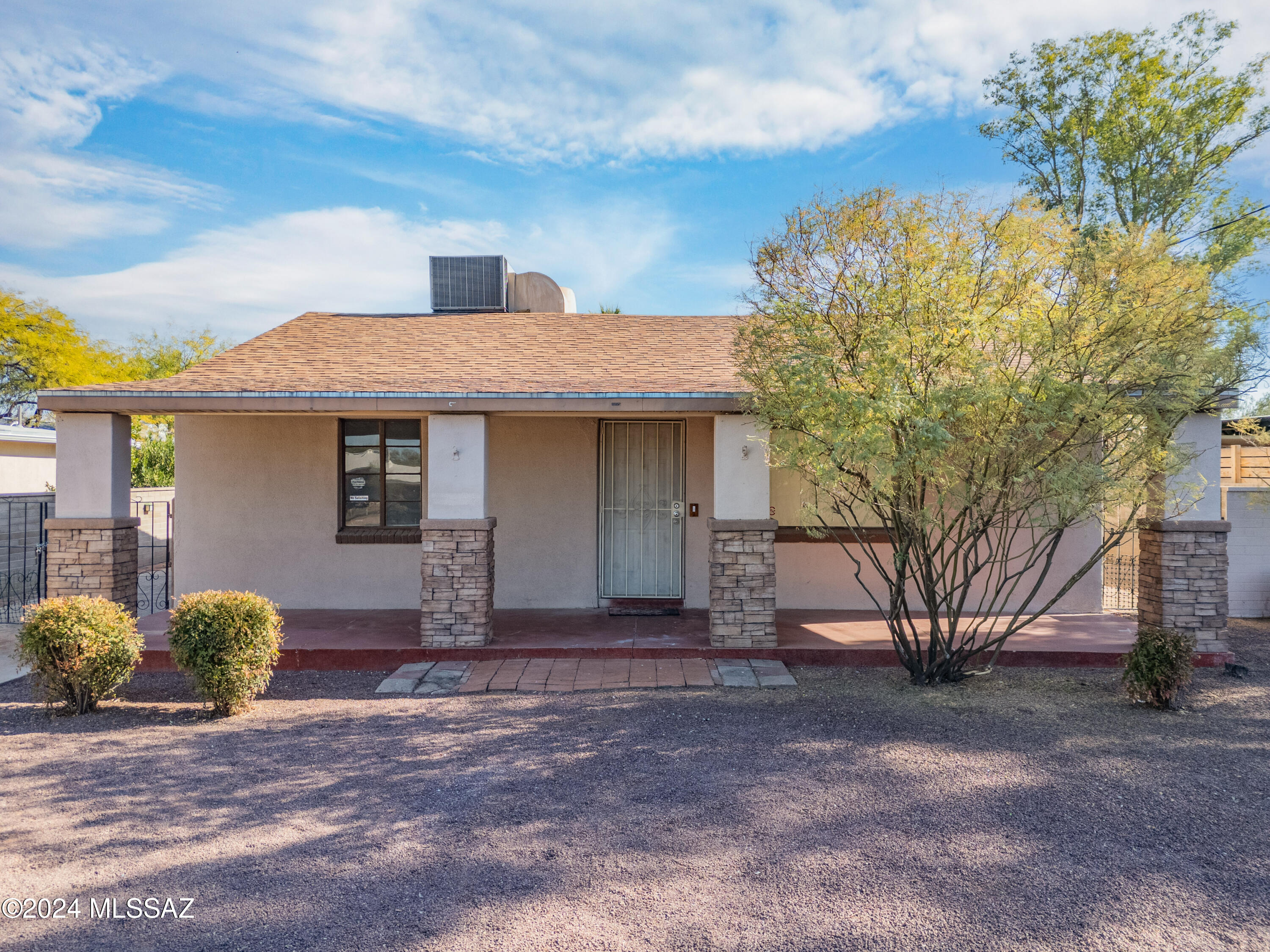 This beautifully updated 4-bedroom, 2-bathroom home is more than just move-in ready—it's also bursting with possibilities! Step inside and fall in love with the sleek, renovated kitchen, complete with 2 skylights, stunning cabinets, state-of-the-art stainless-steel appliances, and elegant countertops that make cooking and entertaining effortless. Cozy up in the spacious living room by the warm, wood-burning fireplace with 2 skylights bringing in lots of natural light. The bathrooms have been updated with tile surround which add a touch of luxury to your daily routine. Behind a gated driveway you will find a bonus spacious storage/workshop room attached to the large carport. But the real standout? The expansive yard, complete with low-maintenance artificial turf, large shade trees, and large covered patio is perfect for outdoor entertaining, relaxing, or play. This home also sits on a large R-2 zoned lot, offering endless potential for future growth. Build an ADU (Accessory Dwelling Unit), guest house, or create your personalized ultimate backyard retreat. This property is the perfect blend of modern upgrades, charm, and opportunity. Don't waitschedule your tour today and start turning your dreams into reality!