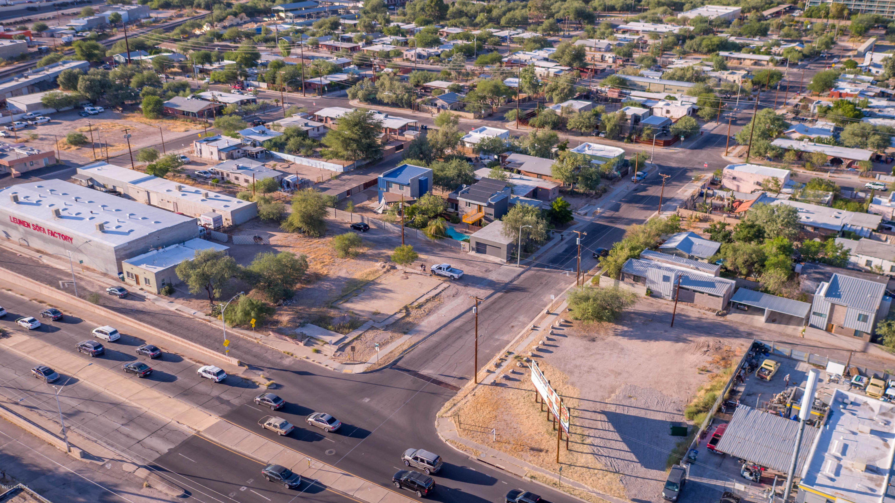 Excellent Investment Opportunity! Bare land with a large billboard that produces a solid return on investment, you don't do anything except trim the grass and collect rent checks.  This land lot is located on one, if not THE busiest street in Tucson Arizona.  Highly visible property with amazing potential!