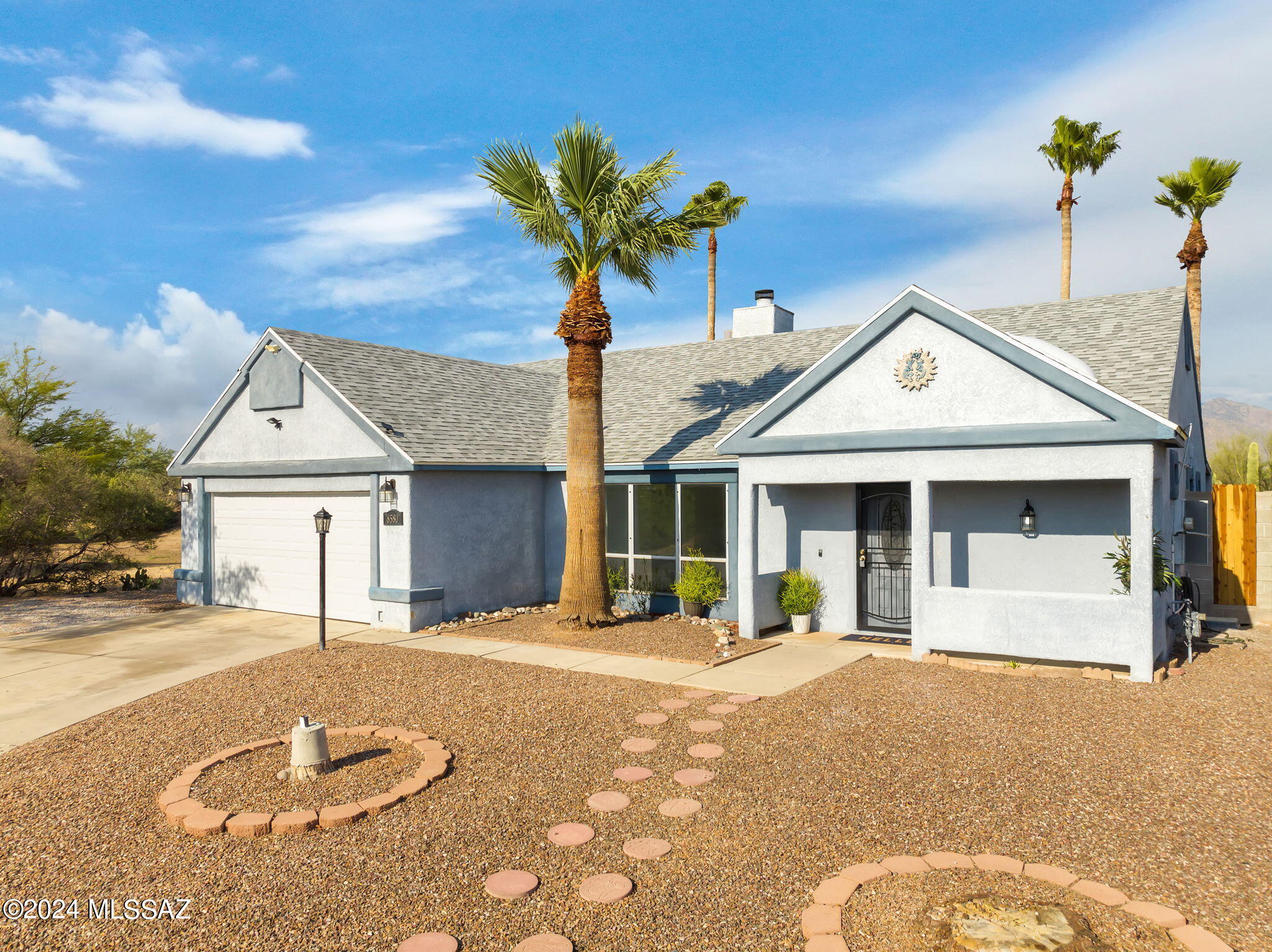 Nice Premium Lot at the end of Cul de Sac W/Open Area on side & rear!!! Great Catalina Mtn Views Split 4br Plan, dual-pane windows & a new sliding glass door ,new carpet in bdrs, Master room has a walking closet , vaulted ceilings, Fireplace, central Air Conditioning, Fresh Paint, tile throughout the whole house except bdrs, new toilettes and new vanities in the bathrooms, upgraded kitchen with new ss sink/faucet and new quartz countertop. Covered Patio with low maintenance desert landscape. NEW garage door with a new motor!!New Fence. Thís Home is a move-in ready with a great Location, &lots of privacy! Owners will entertain offers between $349,000 to $359,000 One of the owners is a licensed real estate broker in AZ