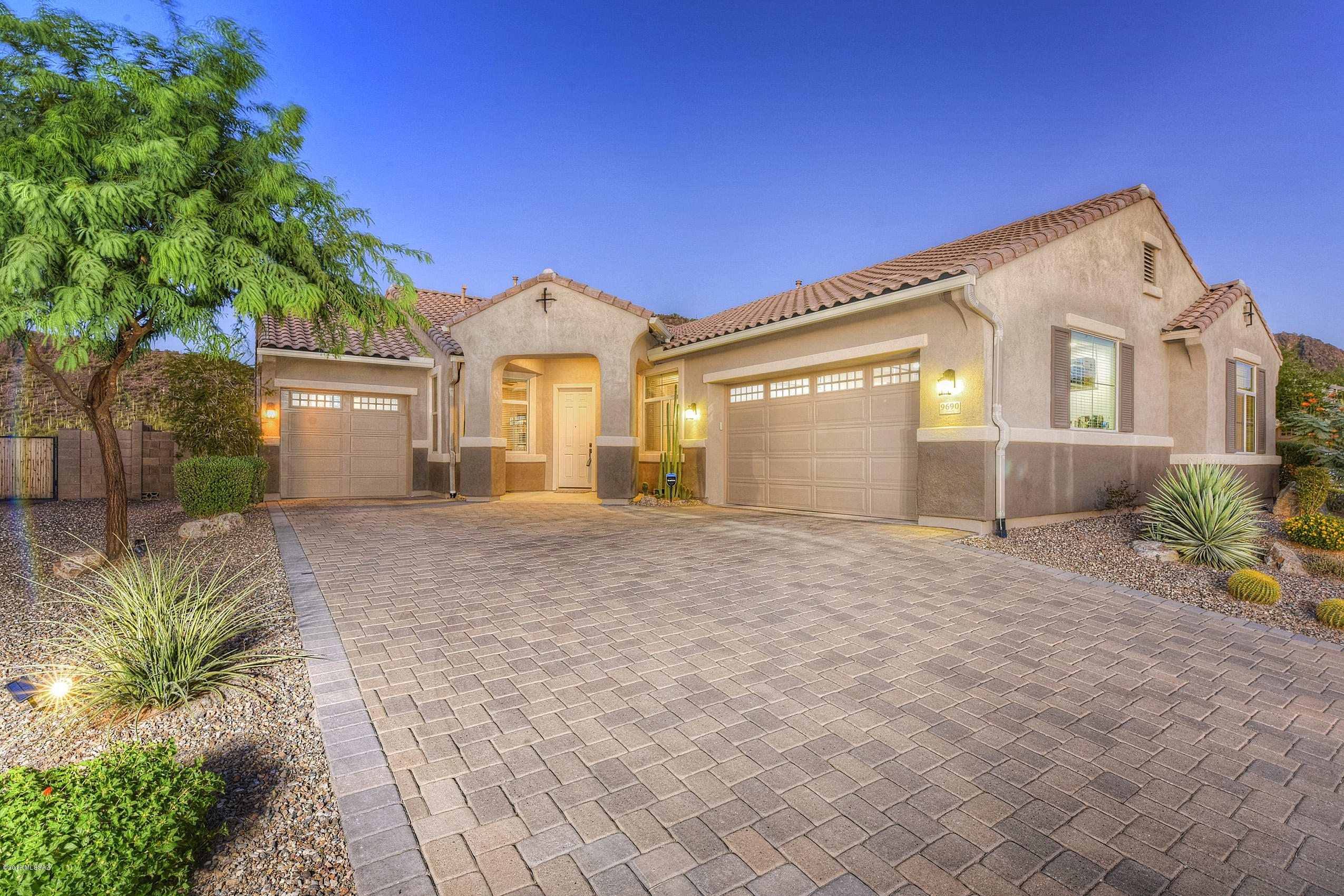 Highly sought after Malibu floor plan in Saguaro Bloom. Breathtaking mountain views from the backyard, with custom water feature. This 3 bedroom, 3 bathroom home built in 2014 has a great open floor plan with natural light and incredible views. Granite countertops, large island, double ovens, RO system, stainless appliances, optional butler's pantry, formal dining room and more. 10' ceilings throughout and 8' interior doors, combined with 3 car garage, foyer and den/office/library provide ultimate floor plan. Incredible single level, split bedroom, floor plan with many upgrades. Two neighborhood parks, with one right down the street, plus Saguaro Bloom is in process of building community center that includes, workout facility, pool, rec room, basketball, volleyball, park and more.