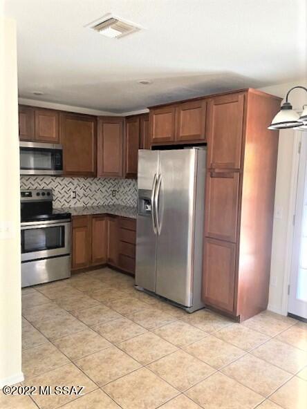 Great home with 3 bedrooms and 2 bath. New Roof, Solar System, Freshly painted with custom colors, Ceramic tile through the house. Family kitchen with granite counter tops, back splash tile, all appliances convey. 
Very move in ready. Large covered patio Home sweet home.