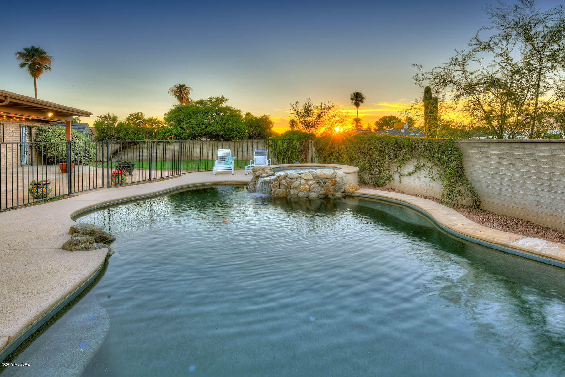 I just love this house! This one has been updated by a wonderful seller with amazing taste. Picture white cabinets, wood floors, and a tasteful color palette. Separate 4th bedroom perfect for guests or office. The backyard is as inviting as the inside. Amazing pool, spa, and refreshing waterfall. Grass, patio, and mountain views complete the perfect outdoor living space. A home like this is a rarity and won't last long!