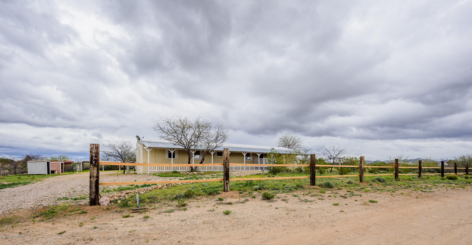 Bring your horses to this super cute 1 acre, 3-bedroom 2 bath single wide home in the sought-after Vail School District.  This freshly painted, recently updated home has an open floor plan.  The master bath has a beautifully tiled, walk in shower with dual shower heads and double sinks. This horse property has oversized sheds and a tack room that convey with the property along with a chicken coop and a concrete basketball half-court.  Easy access to I-10 and several shopping areas nearby.