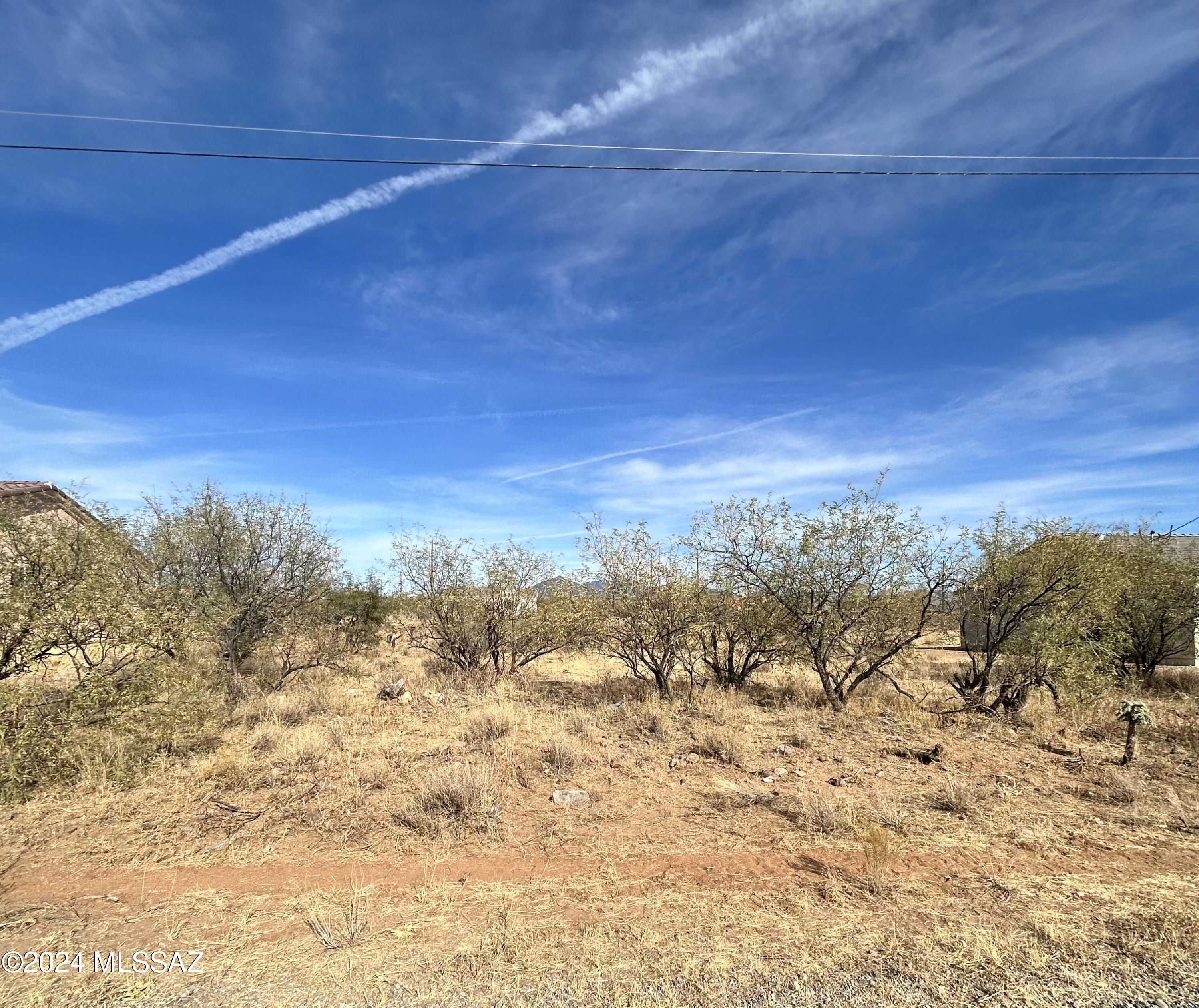 Nice flat buildable lot. Utilities available. Water should be at street. Always verify utilities. Paved street. Highly desirable neighborhood. NO HOA