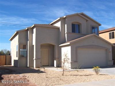 Energy Efficient Two-Story Home with 3 Bedrooms and 2 1/2 Baths and Ready to move in. Bright open floor plan with Large Living Room, Dining Area, and Family Room. Kitchen includes Breakfast Bar, Refrigerator, Range, Microwave and Dishwasher. Easy Access to Anywhere in Tucson. All Pets Must be Preapproved by Owner with Depost.