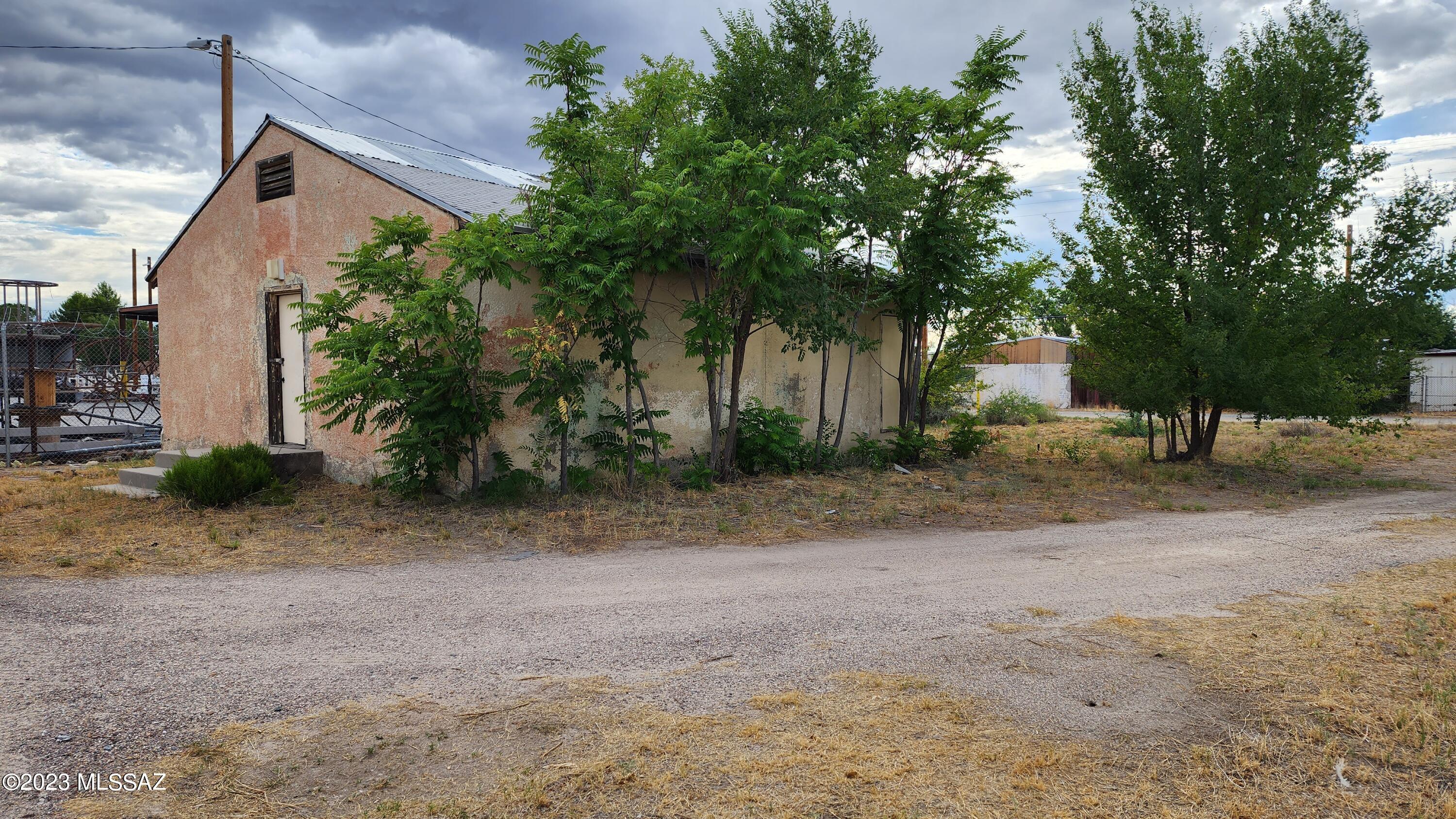 Own a small piece of Willcox History.  This 821 sq House /  Building was Built in 1940 and housed the Boy Scouts meeting place from the 1960's - 2000's ( other uses are unknown to current owner).  There is even some remaining memorabilia from that time frame still in the Building. Building has ORIGINAL Hardwood Floors. This property is Zoned (R-3) and taxed as Residential in the City of Willcox.  Needs remodeling, repairs and Updating - total FIXER UPPER.  Large Lot, perfect for a Home, Airbnb or rental property.  
Seller will NOT turn on Utilities nor remove / clean out property. NO repairs will be made.