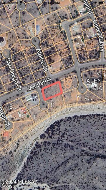Flat easy to build on residential lot with all paved access.  Electric service at the street.  Water service should be verified with the water company by the Buyer.  Mountain views.
