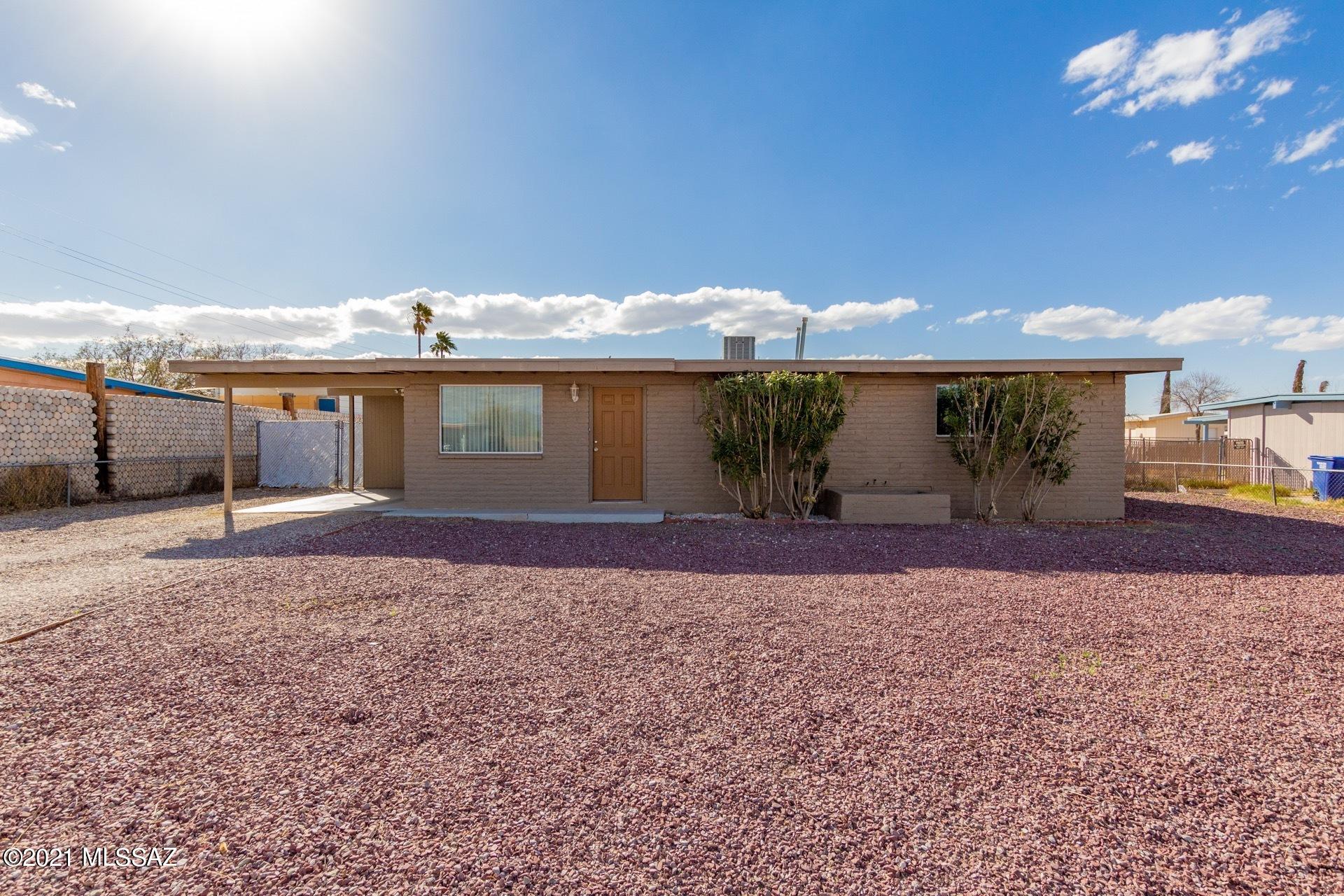 Seller will entertain offers between $194900 - $204900.  Come by and check out this beautifully updated home!  This home includes AC, tile flooring throughout the main living areas, updated kitchen with stainless steel appliances, 6 panel interior doors, remodeled bathrooms with tile surrounds, and a large rear yard!  This home offers plenty of room for inside and outside entertaining.  Inside you will enjoy the open great-room feel and outside the large covered patio and extra storage!